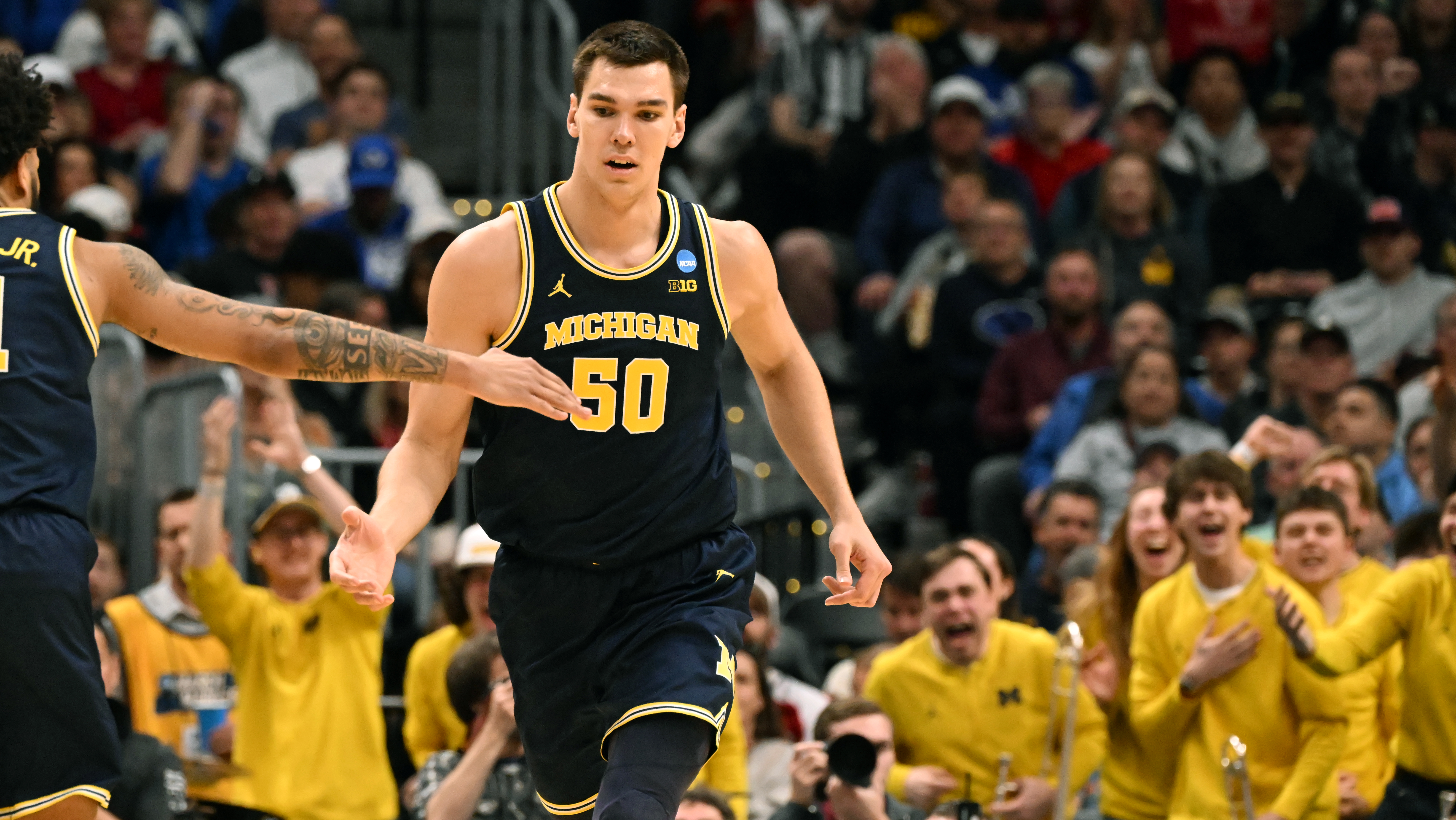 Michigan coach Dusty May’s relationship with Vlad Goldin helps duo get back to Sweet 16