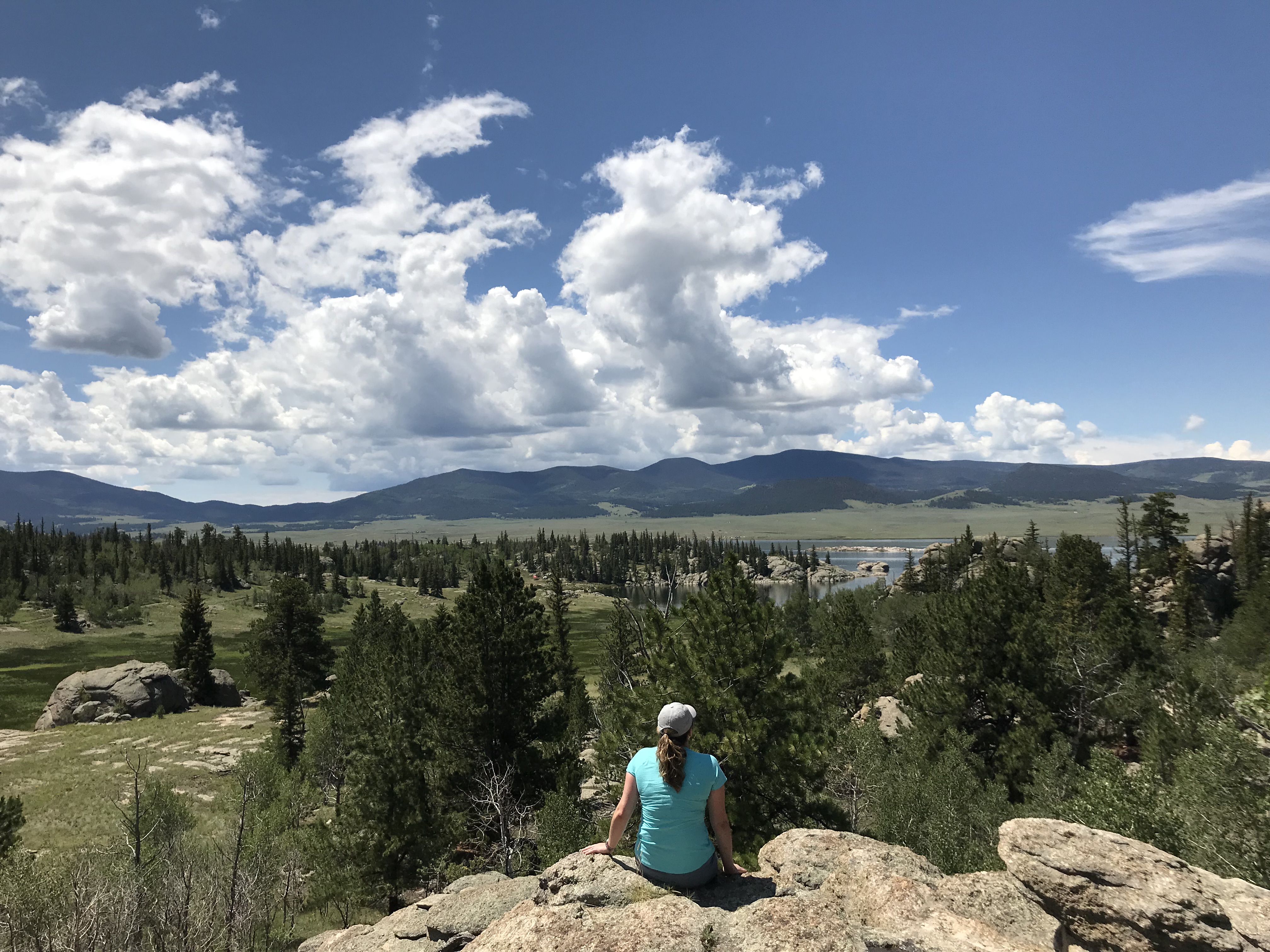 A hiker takes in the view of Eleven Mile State Park from an overlook along the Aspen Loop. (The Gazette)