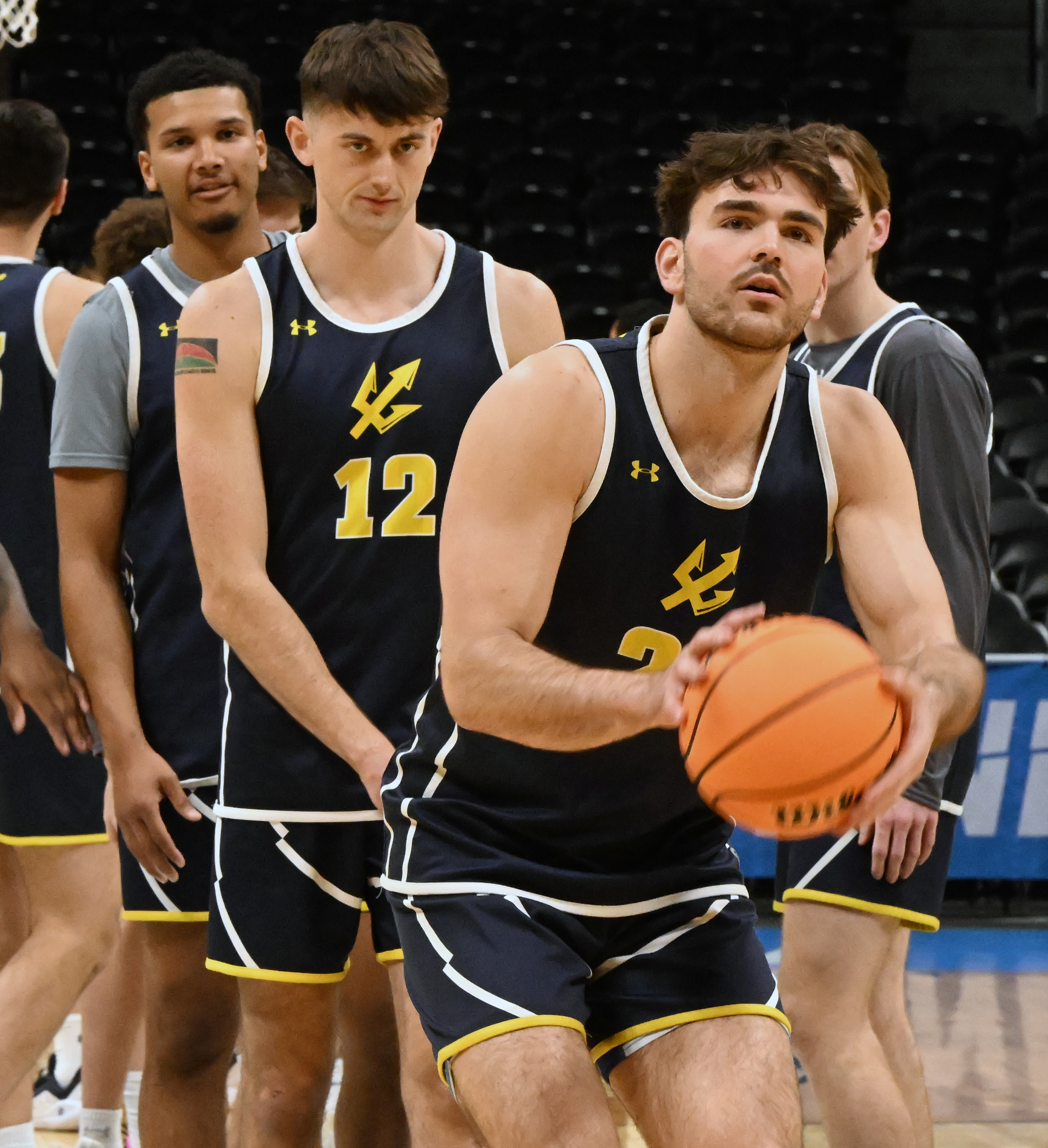 UC San Diego’s Nordin Kapic shoots the ball while Aniwaniwa Tait-Jones and Chris Howell wait to take their turn during practice day on Wednesday, March 19, 2025, at Ball Arena for the NCAA March Madness tournament. The first round of the tournament starts on Thursday. (Jerilee Bennett,The Gazette)