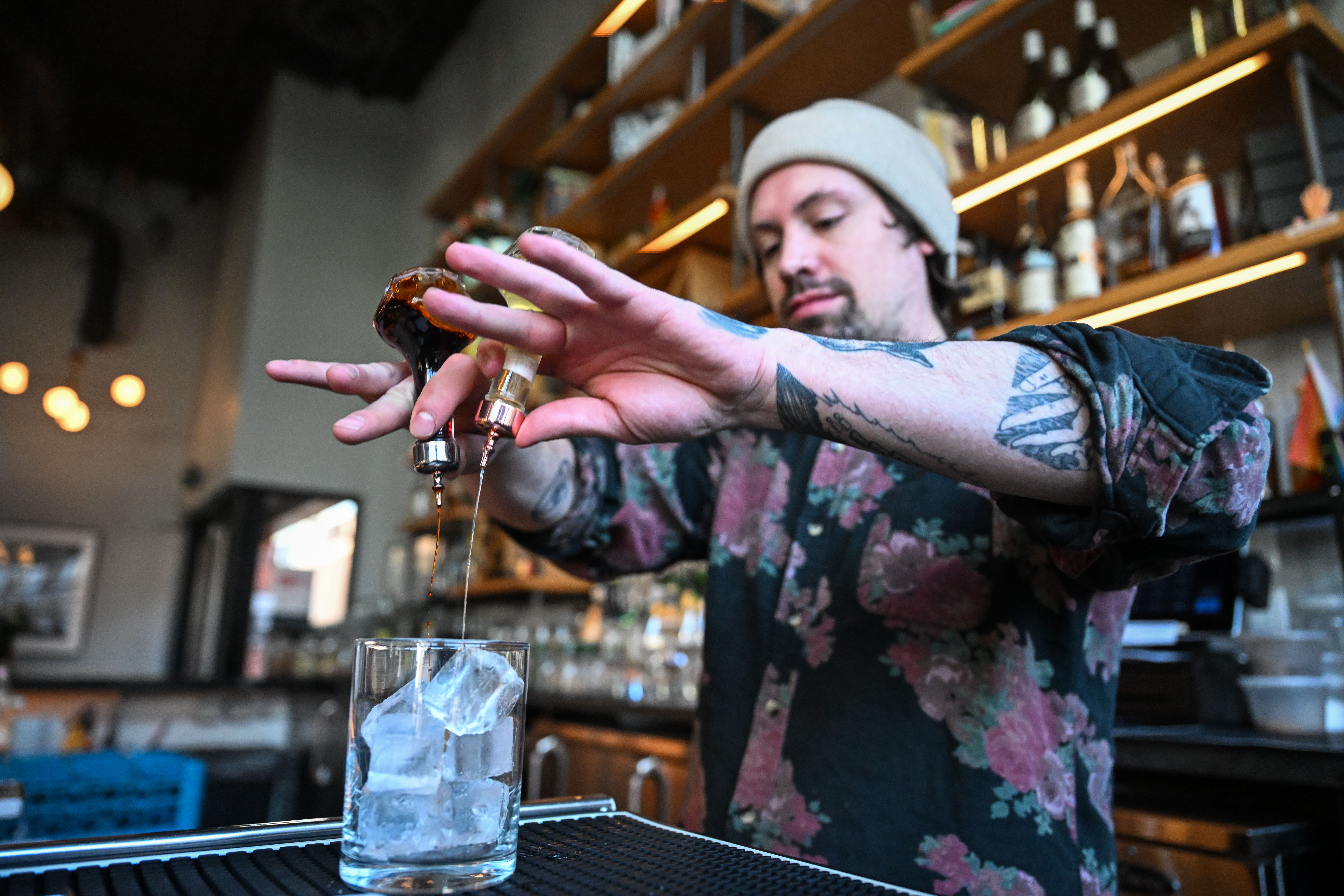Alex Caffery, a bartender at The Greenwich, makes an old fashioned for a customer during a shift in Denver's RiNo neighborhood on Friday, Feb. 28, 2025. (Stephen Swofford, Denver Gazette) (StephenSwoffordPhotographerstephen.swofford@gazette.comhttps://secure.gravatar.com/avatar/1ddcaf11c5d70eaa58546ddc4e038687?d=mm&r=g)
