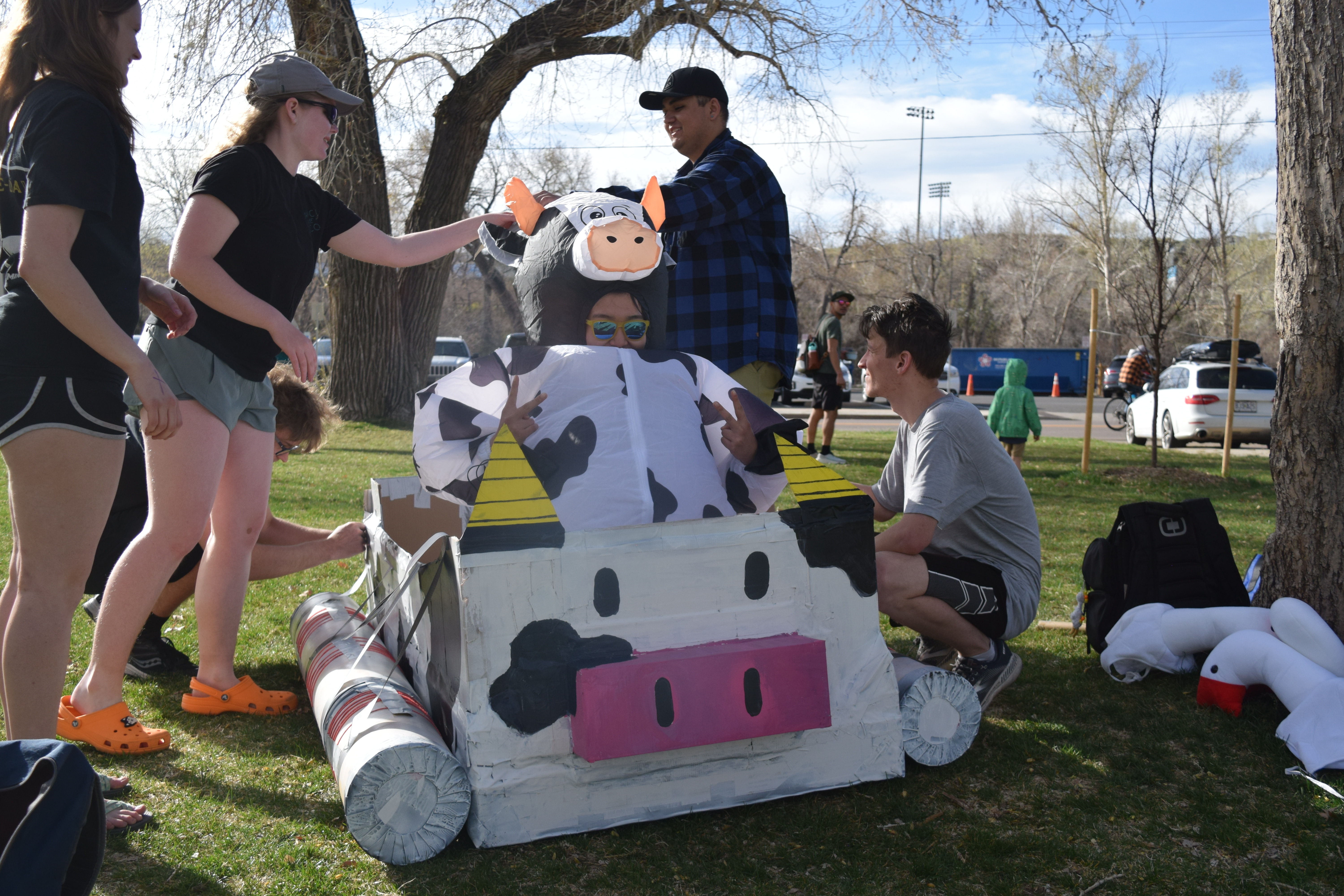 Third-year Civil Engineering student, Seohun Park, dons a cow costume to ride in a cardboard cow boat during the Colorado School of Mines' cardboard boat race Saturday. (SageKelleyJefferson County Reportersage.kelley@denvergazette.comhttps://denvergazette.com/content/tncms/avatars/e/5f/457/e5f45740-2717-11ee-85b2-ab80f2d36252.5b966c1d2ce4987987665d57c237eda4.png)