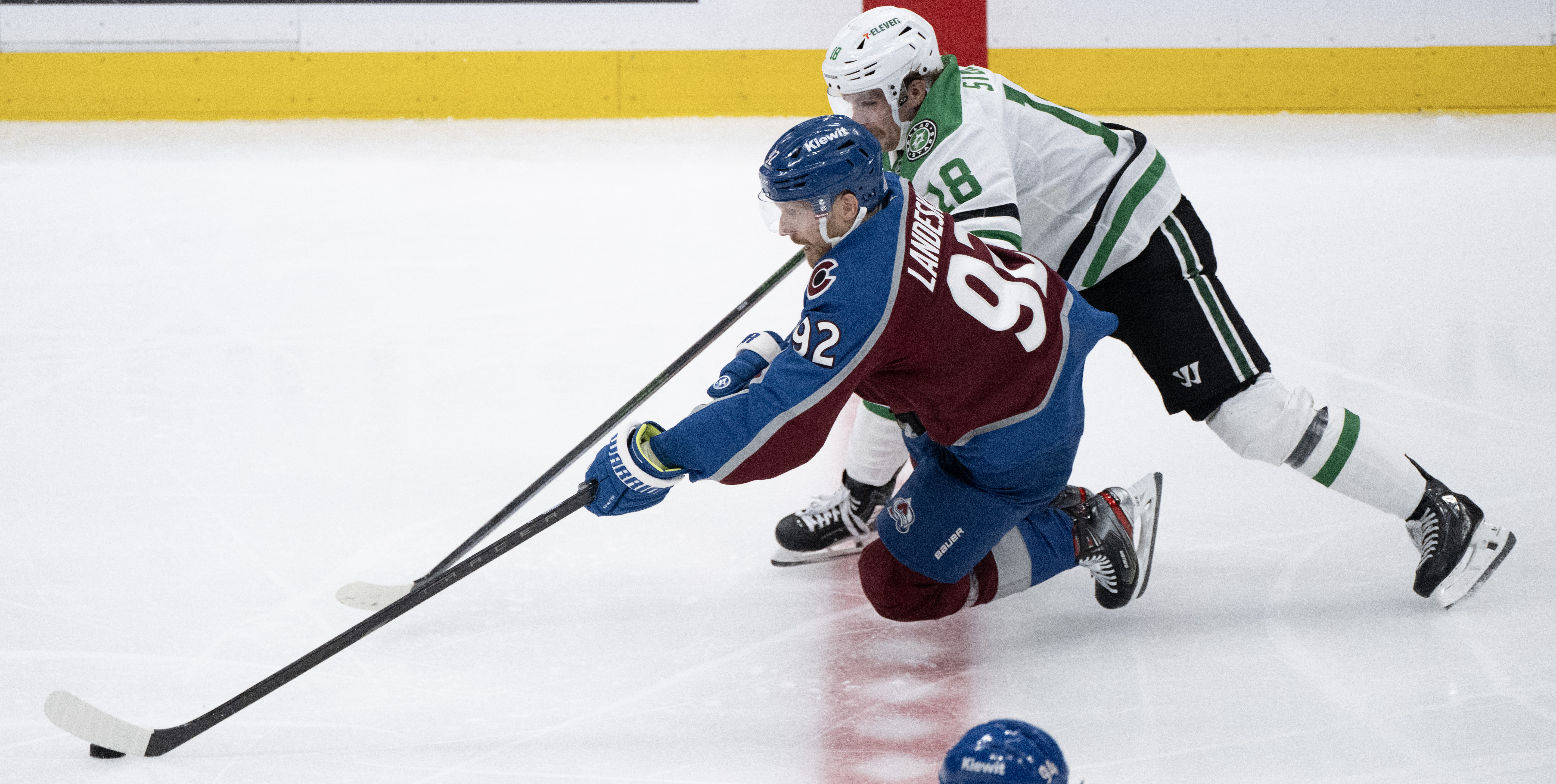 Colorado Avalanche left wing Gabriel Landeskog (92) battles Dallas Stars center Sam Steel (18) for the puck during the third period Wednesday, April 23, 2025, at Ball Arena in Denver. (The Gazette, Christian Murdock) (Christian Murdock)