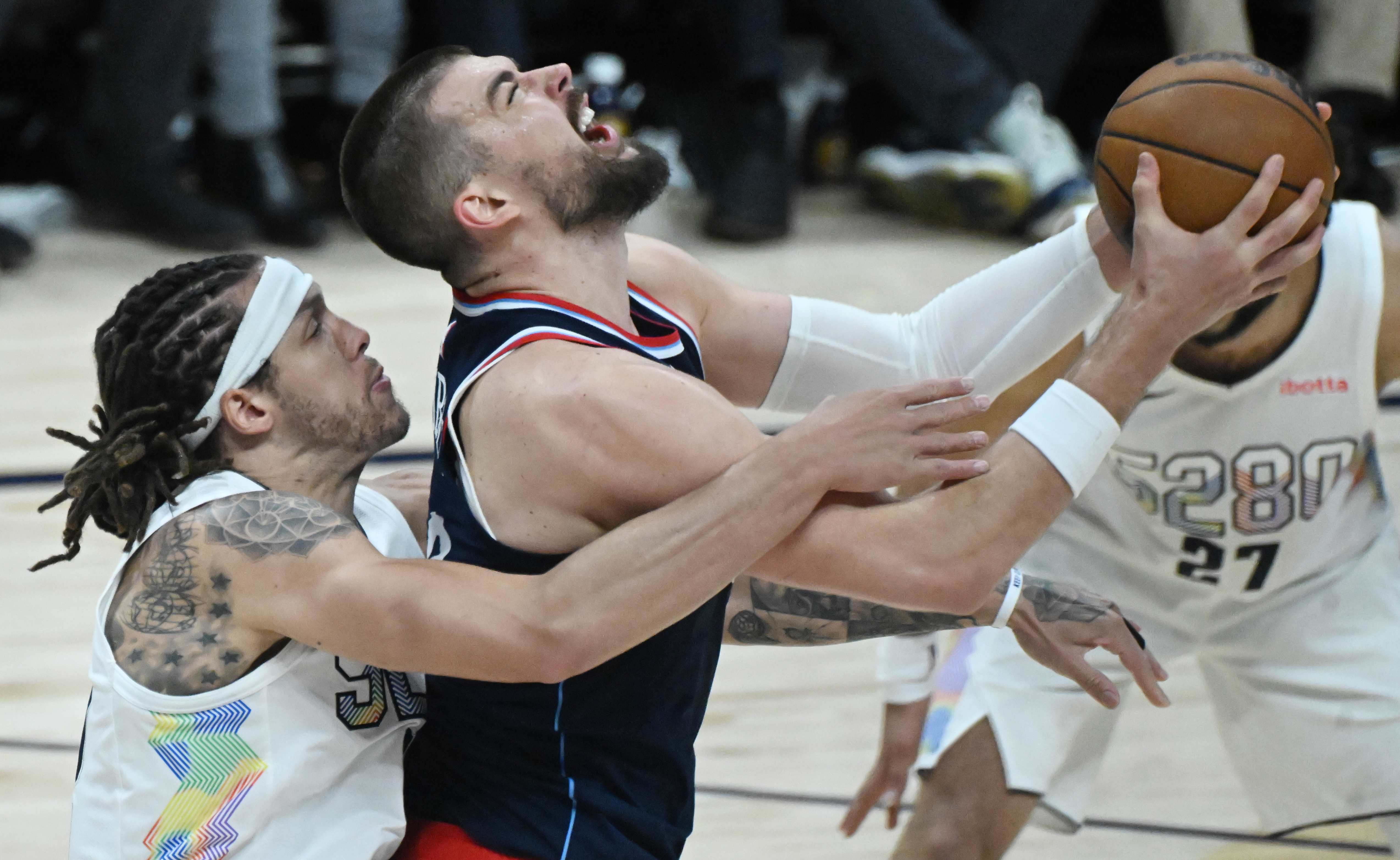 Denver Nuggets forward Aaron Gordon (32) puts pressure on LA Clippers center Ivica Zubac (40) during the 4th quarter of game 5 of the first round of the Western Championships at Ball Arena on Tuesday, April 29, 2025. (Jerilee Bennett,The Gazette)
