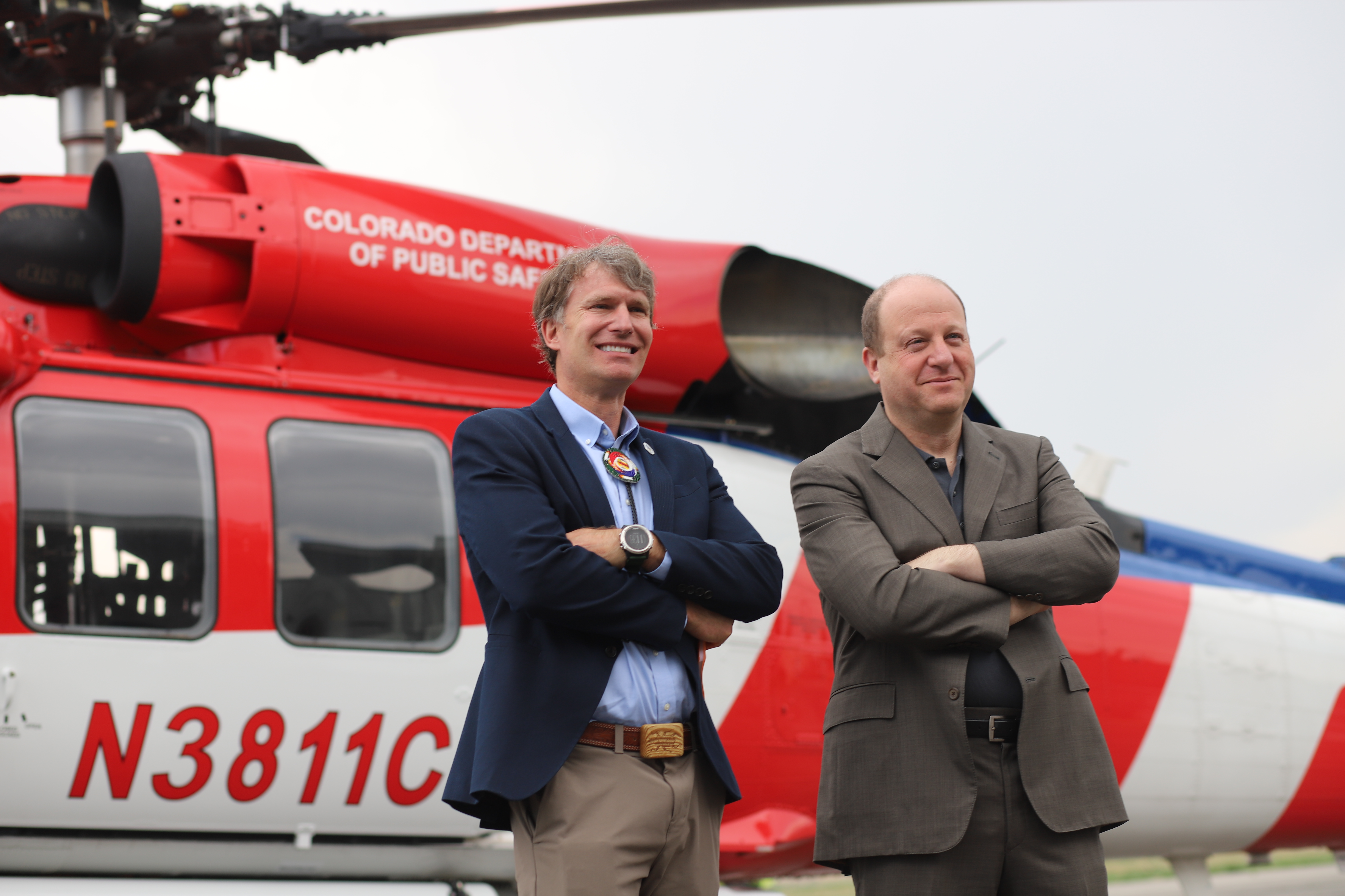 Department of Natural Resources Director Dan Gibbs stands next to Colorado Gov. Jared Polis in front of a Department of Public Safety fire helicopter on April 24, 2025. (KylaPearceAurora reporterkyla.pearce@denvergazette.comhttps://denvergazette.com/content/tncms/avatars/2/16/1e5/2161e54a-3f47-11ed-bc0c-ff41892600ae.4fb8f678b9b96eab286c33c5af828fe7.png)