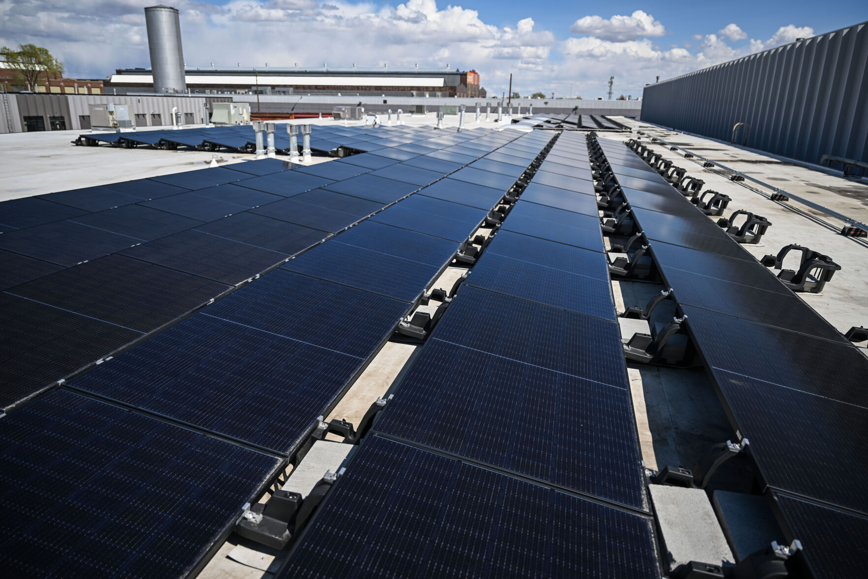 Last year, David Spriggs had 112 kilowatts of solar panels installed on his two newest properties in North Denver at a cost over $1 million. The estimated solar gain would show a return of 159% against the buildings’ expected electric usage. When Spriggs plugged the specifics into Energize Denver’s latest guidelines, the reduction from solar was still short of compliance. David Spriggs stands with a row of solar panels on the roof of one of his buildings in Denver on Wednesday, April 2, 2025. (StephenSwoffordPhotographerstephen.swofford@gazette.comhttps://secure.gravatar.com/avatar/1ddcaf11c5d70eaa58546ddc4e038687?d=mm&r=g)