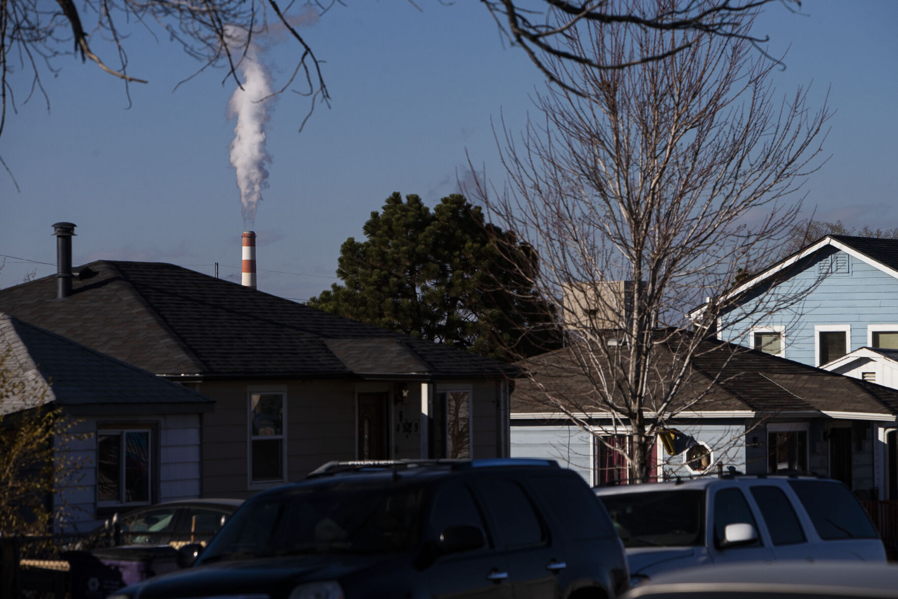Plumes of steam from the Cherokee Generating Station stacks can be seen from the Elyria-Swansea neighborhood on Wednesday, Nov. 17, 2021, in Denver. (Tim Hurst, The Denver Gazette File)