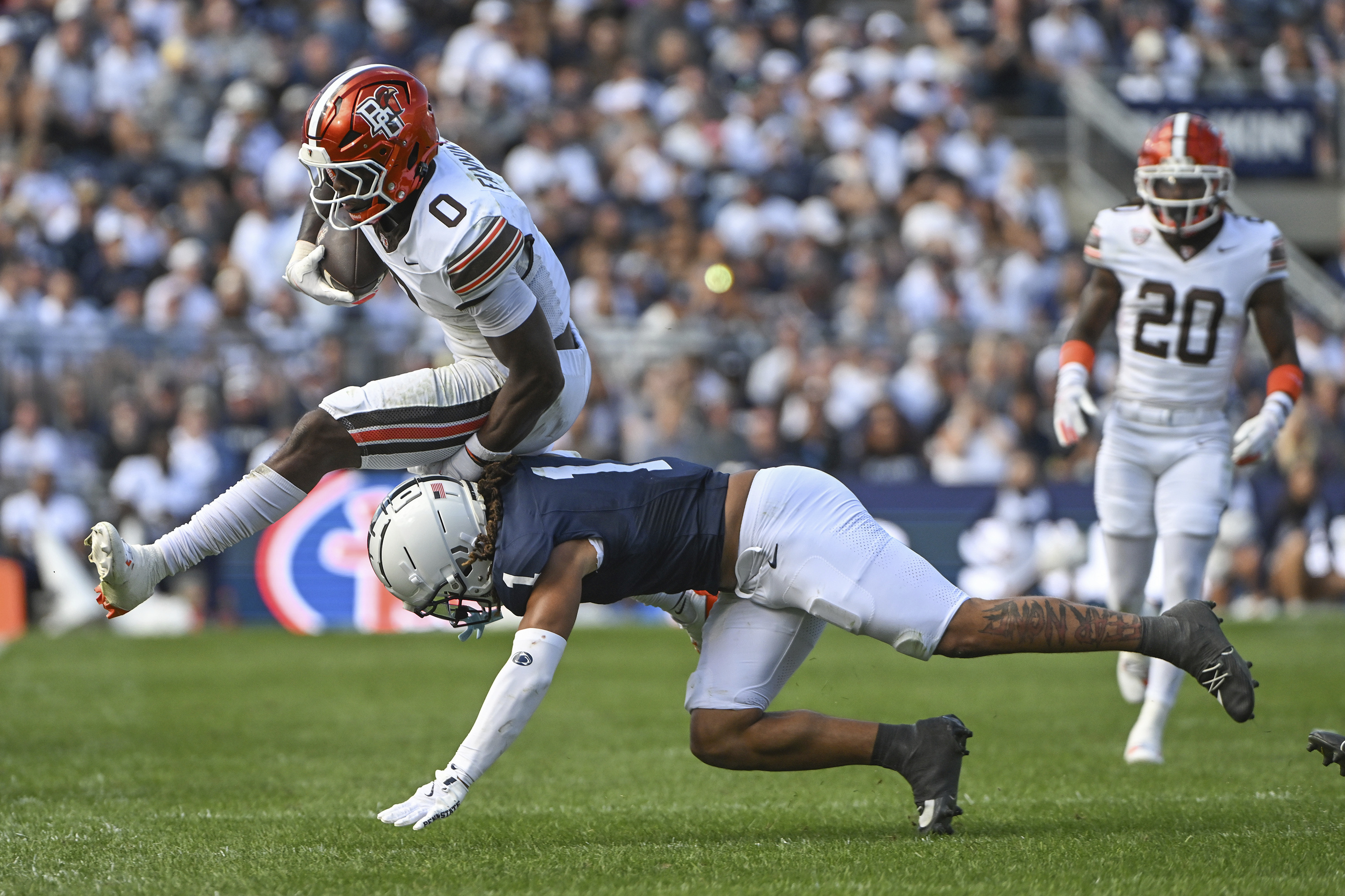Penn State safety Jaylen Reed (1) tackles Bowling Green tight end Harold Fannin Jr. (0) during the fourth quarter of an NCAA college football game, Saturday, Sept. 7, 2024, in State College, Pa. (AP Photo/Barry Reeger) (Barry Reeger)