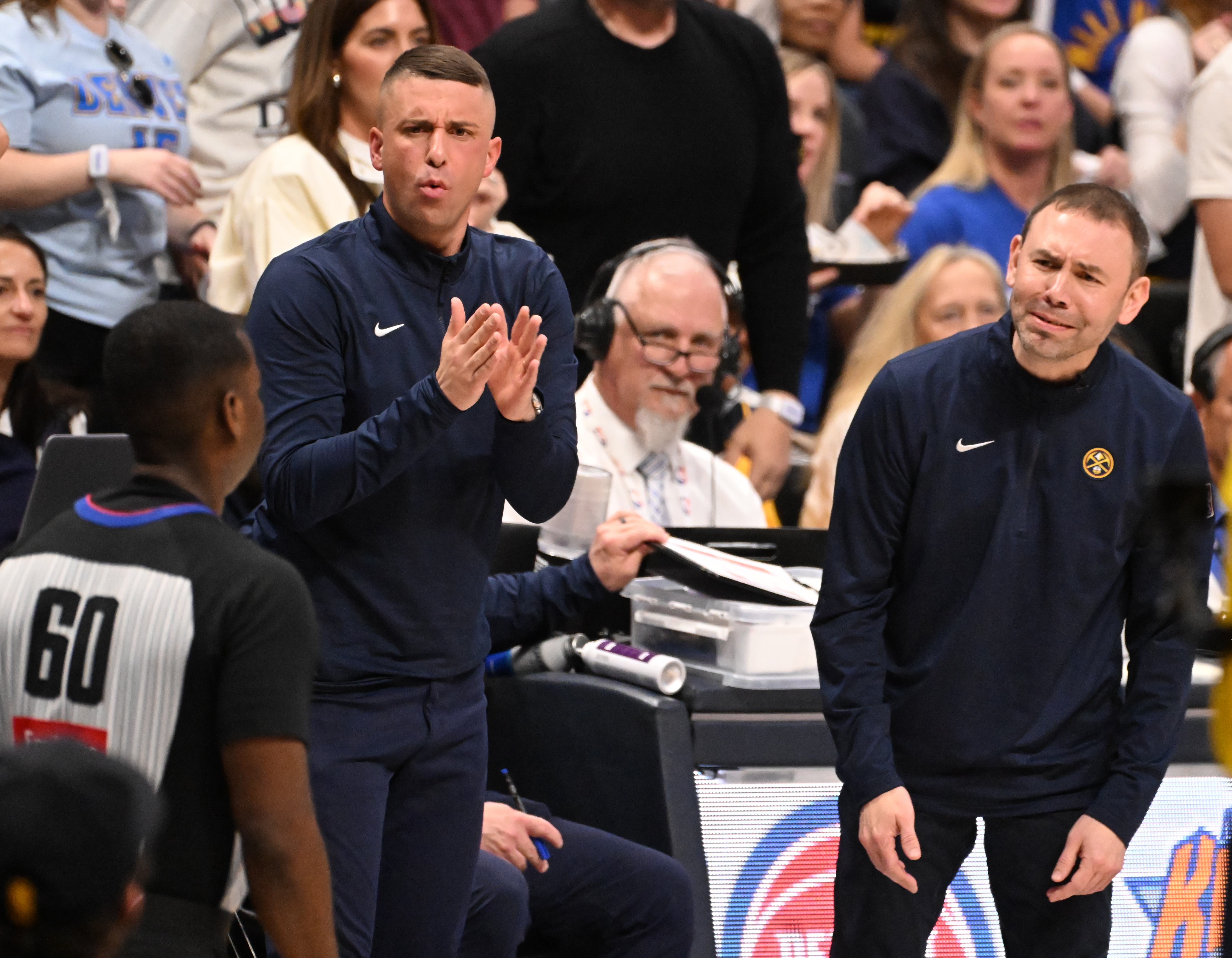 Nuggets asst. coach Ryan Saunders and interim Head Coach David Adelman question the official in the game of the first series of the NBA playoffs at Ball Arena on Saturday, April 19, 2025. The Nuggets won the game in overtime 112-110. (Jerilee Bennett,The Gazette)