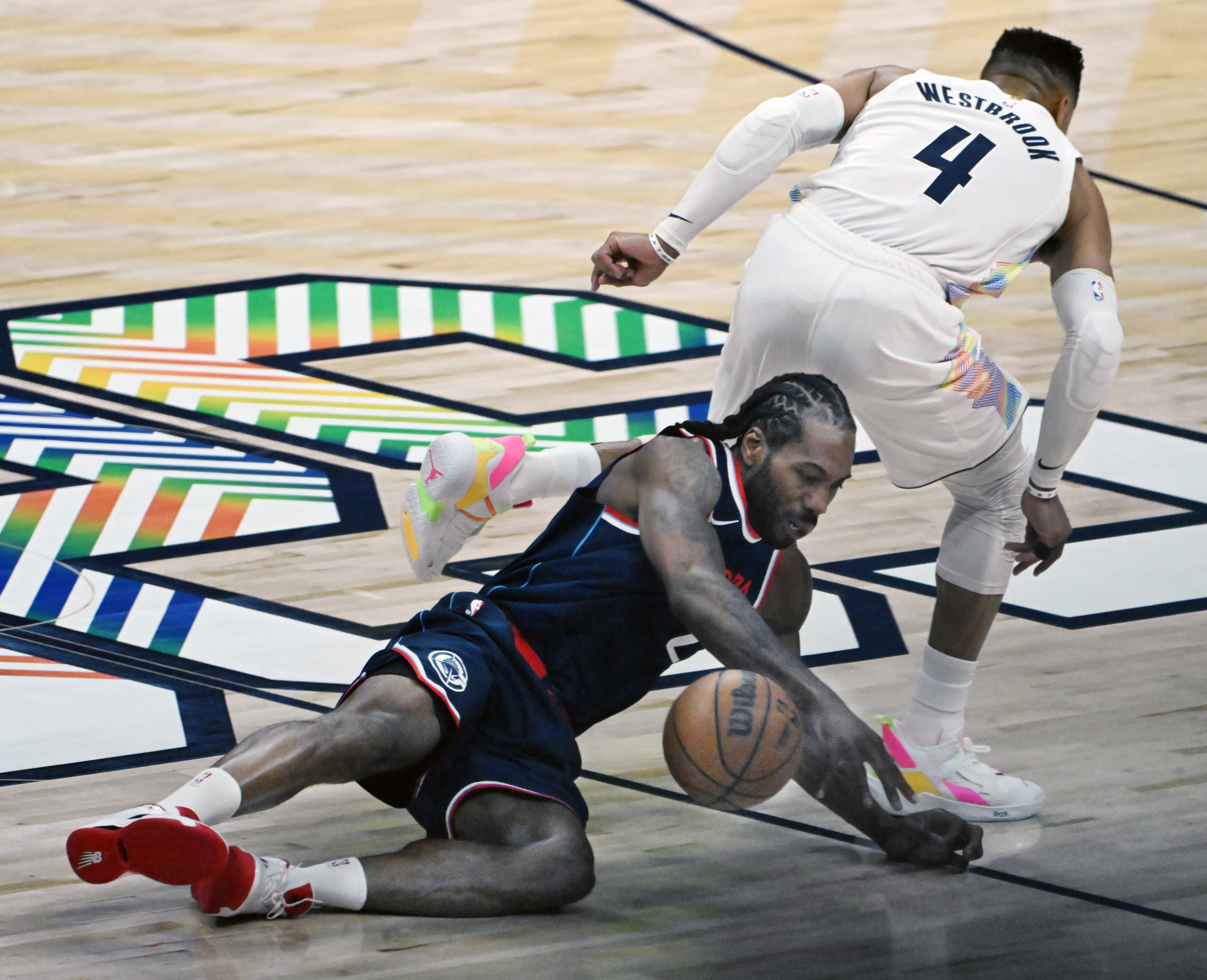 LA Clippers forward Kawhi Leonard (2) loses control of the ball while being defended by Denver Nuggets guard Russell Westbrook (4) during game 5 of Round 1 against the Clippers on Tuesday, April 29, 2025. The Nuggets won the game 131-115. (Jerilee Bennett,The Gazette)