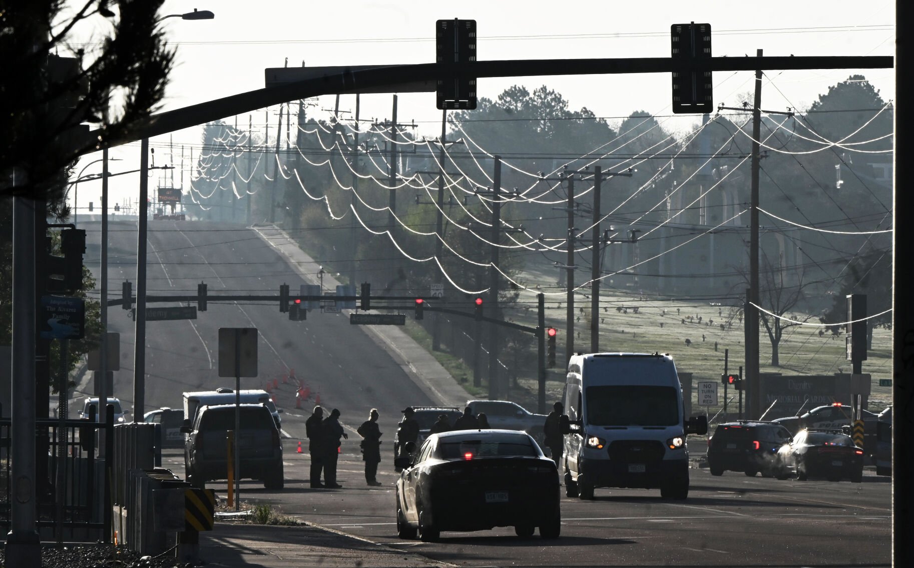 Early Sunday morning, law enforcement vehicles filled the streets surrounding an underground nightclub that was raided by the DEA. The nightclub is located at the northwest corner of Academy Boulevard and Airport Road. More than 100 people who were reported to be in the country illegally were detained in a raid at a nightclub Sunday, April 27, 2025, according to Drug Enforcement Administration officials. (Jerilee Bennett, The Gazette)