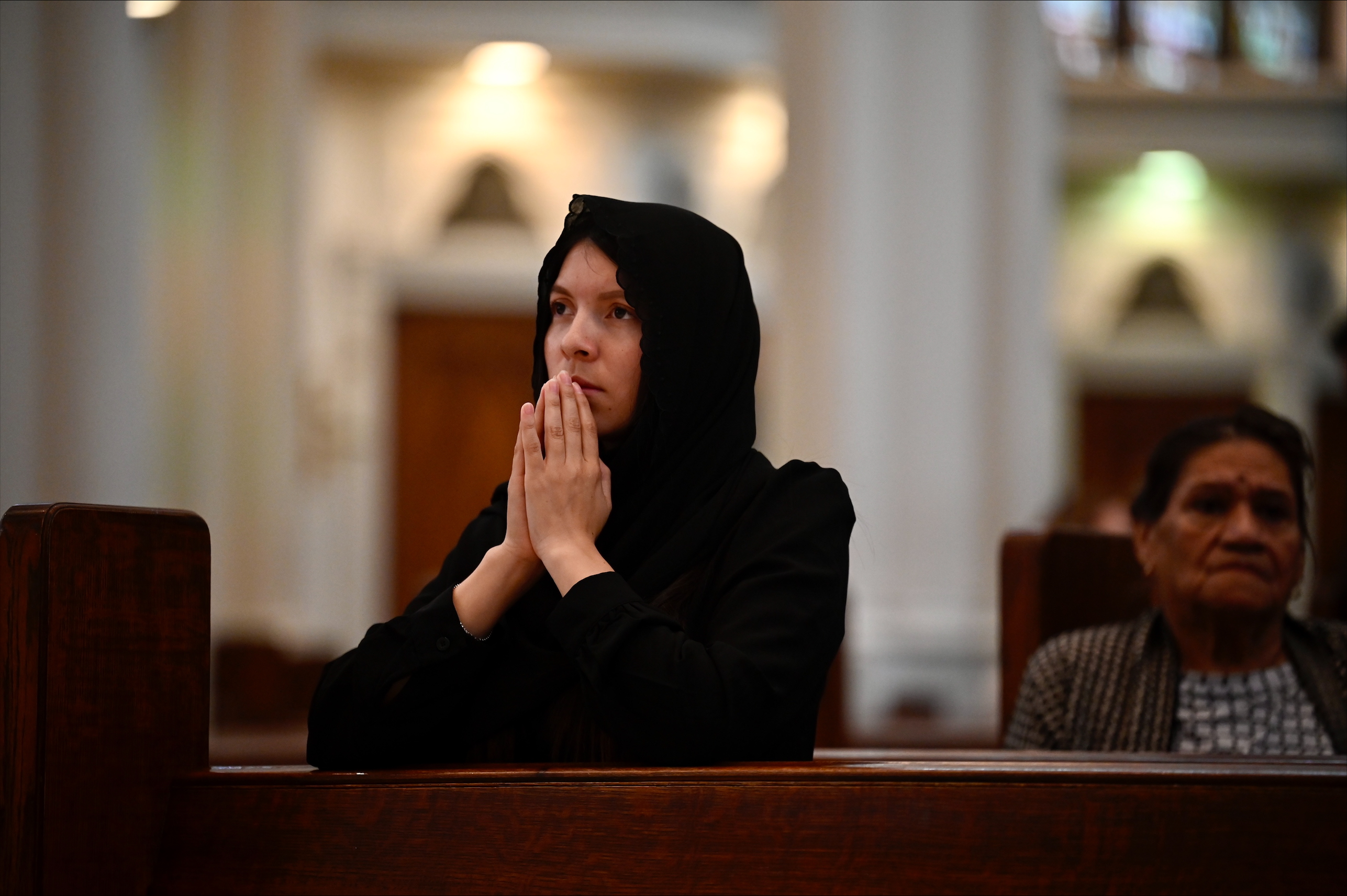 Parishioners pray for the late Pope Francis at the Cathedral Basilica of the Immaculate Conception in Denver Monday. (StephenSwoffordPhotographerstephen.swofford@gazette.comhttps://secure.gravatar.com/avatar/1ddcaf11c5d70eaa58546ddc4e038687?d=mm&r=g)