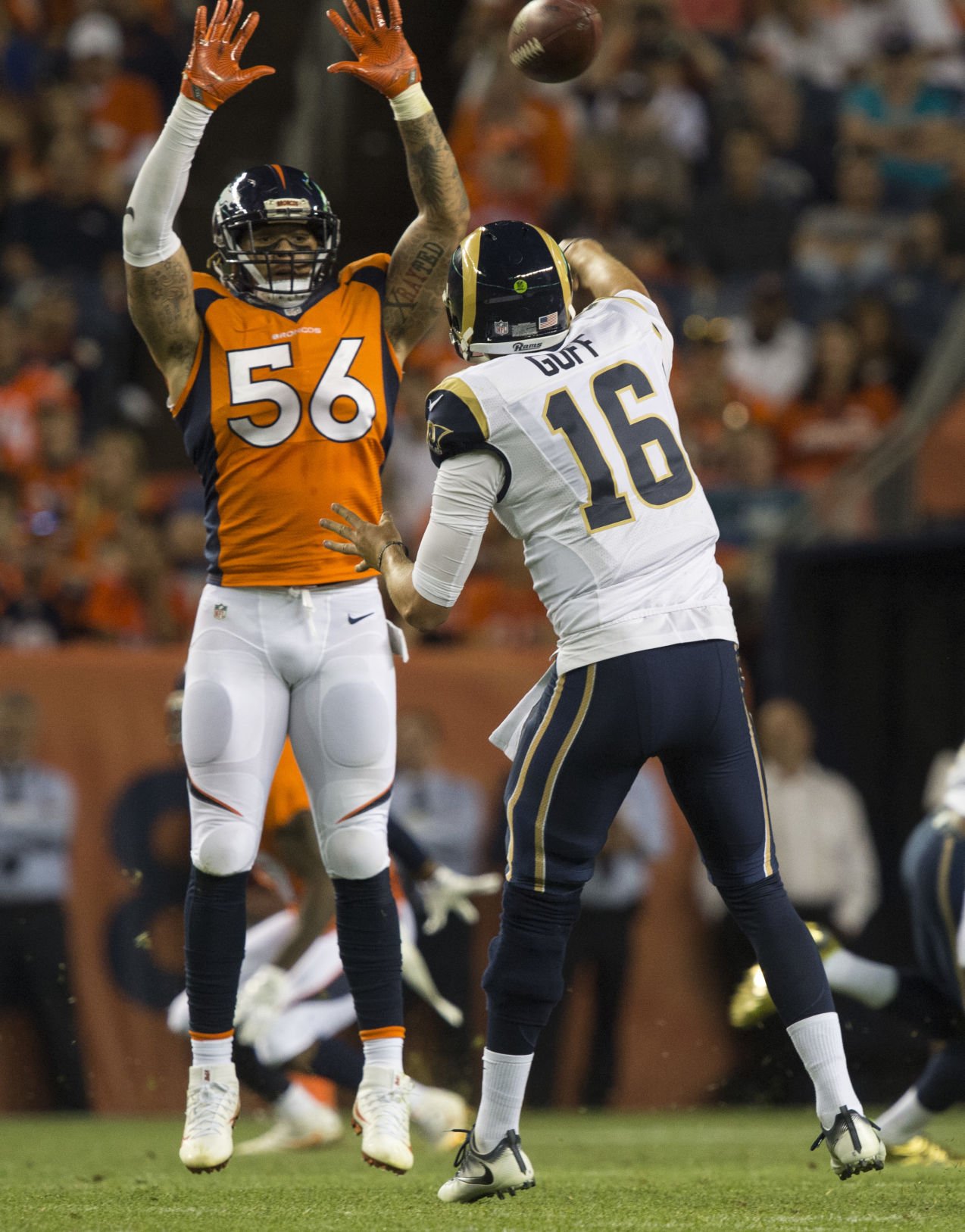 Rams quarterback Jered Goff throws the ball out of bounds as Broncos linebacker Shane Ray pressures him during the second quarter Saturday, Aug. 27, 2016, at Sports Authority Field at Mile High in Denver. (The Gazette, Christian Murdock) (CHRISTIAN MURDOCK, THE GAZETTE)