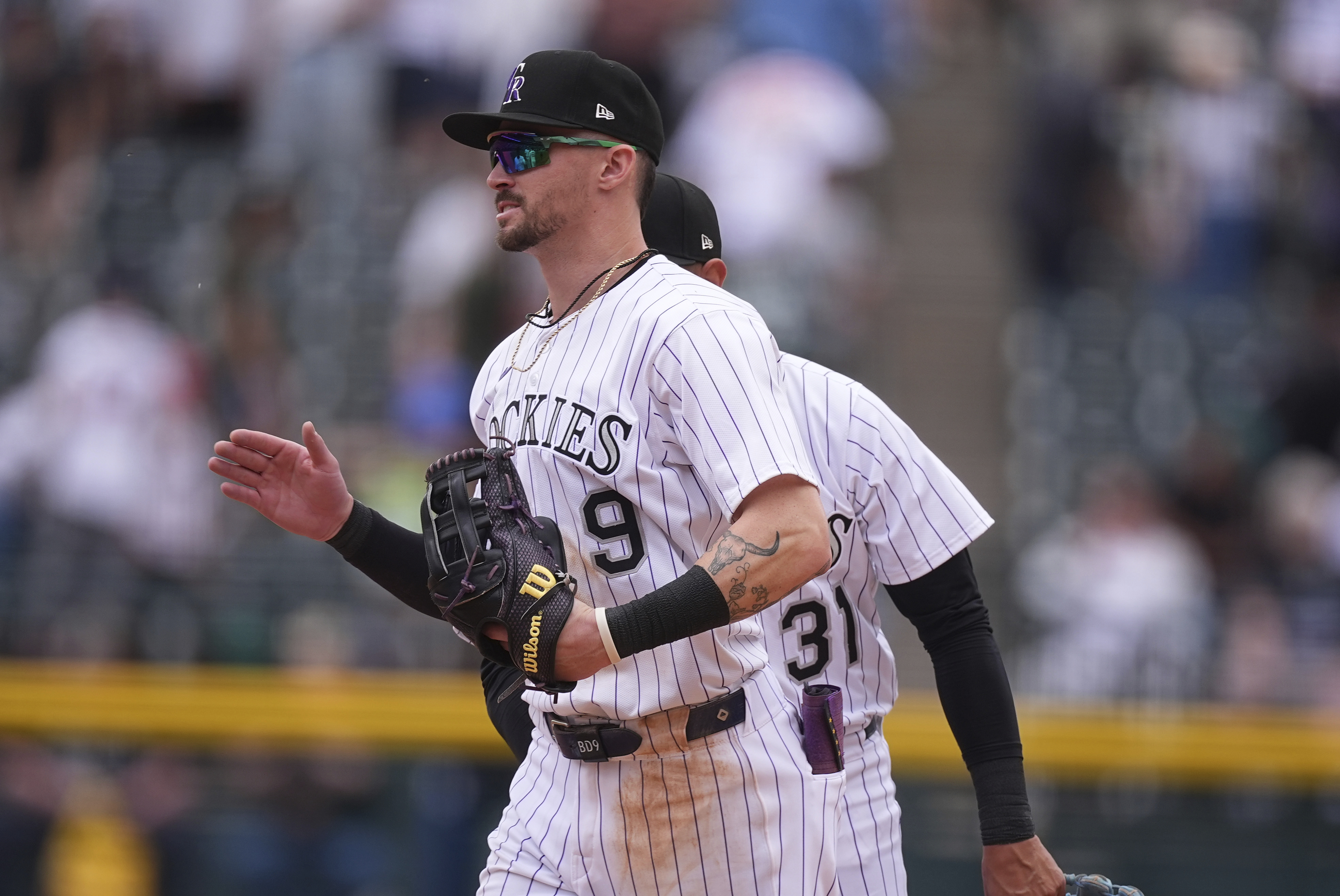 Colorado Rockies center fielder Brenton Doyle is congratulated after a baseball game against the Atlanta Braves on Wednesday, April 30, in Denver. (The Associated Press)