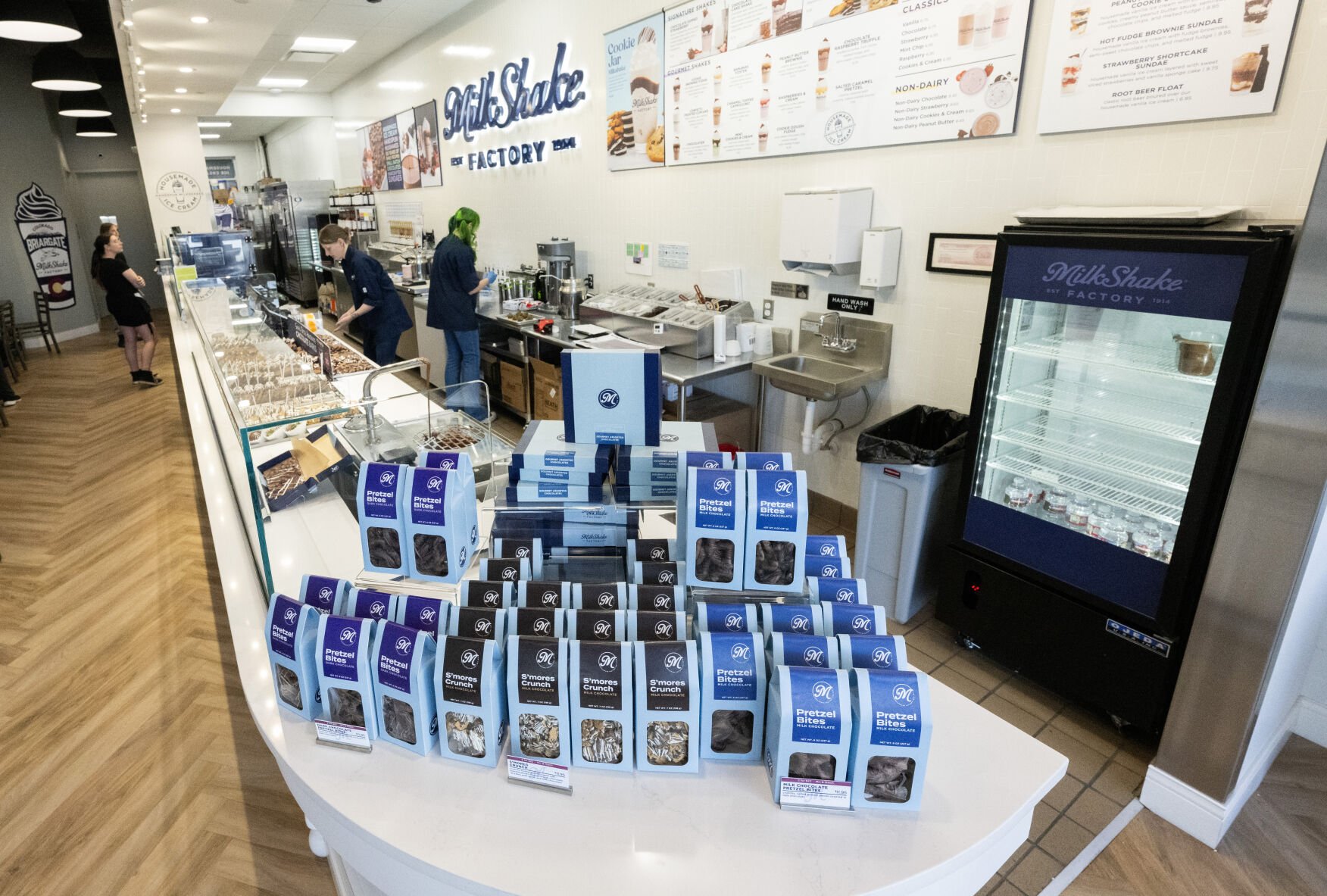 Natalie Mahaffey, right, makes a milkshake while Megan Green works the counter at the MilkShake Factory Tuesday, April 22, 2025, in Colorado Springs. The store's grand opening celebration is Saturday, April 26, 2025. (Christian Murdock, The Gazette)