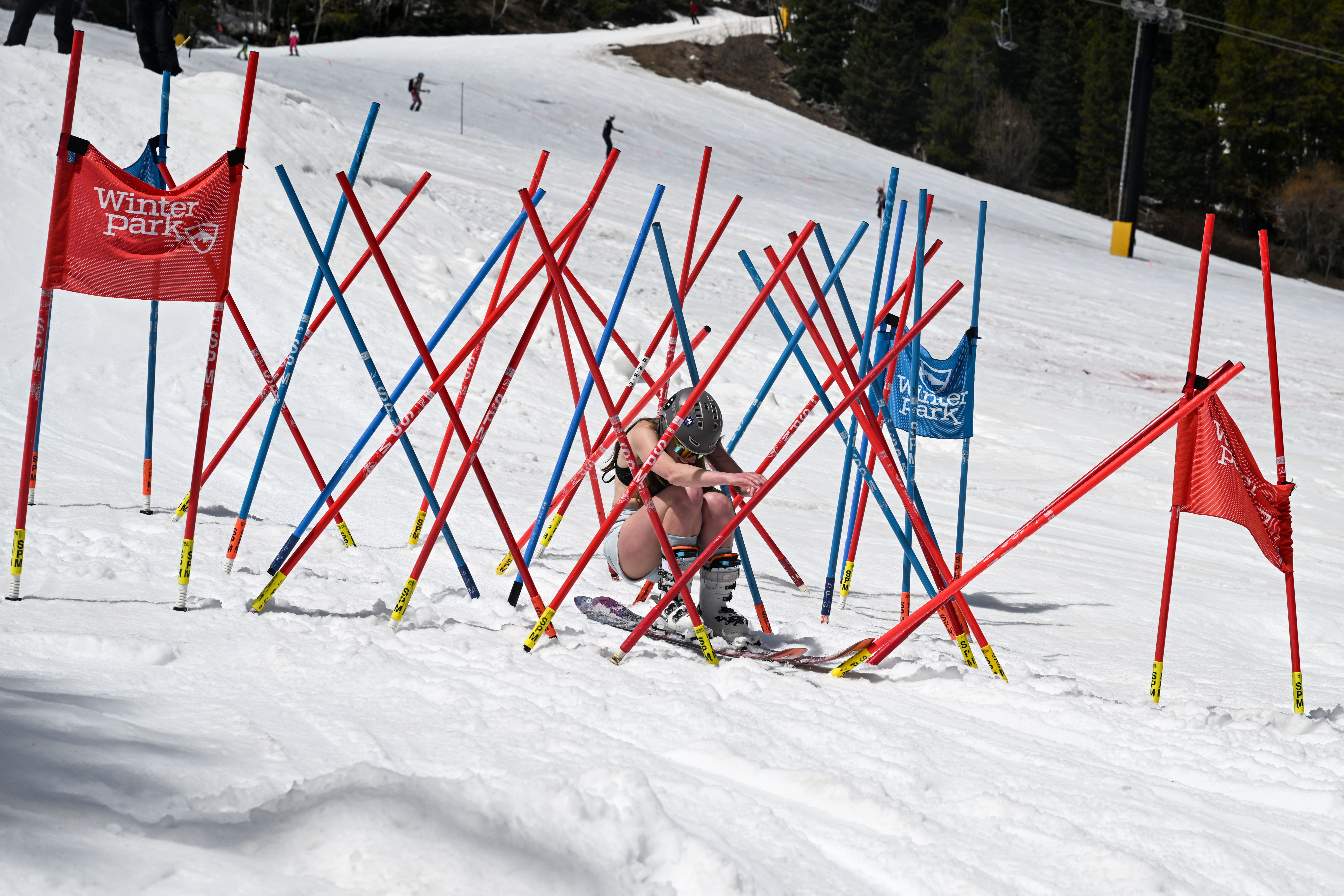 A skier crosses through the “bamboo forest”, part of an obstacle course ending with a pool of water at the base of Winter Park during the Spring Splash event to celebrate the last day of the season on Sunday, April 27, 2025 (Stephen Swofford, Denver Gazette) (StephenSwoffordPhotographerstephen.swofford@gazette.comhttps://secure.gravatar.com/avatar/1ddcaf11c5d70eaa58546ddc4e038687?d=mm&r=g)