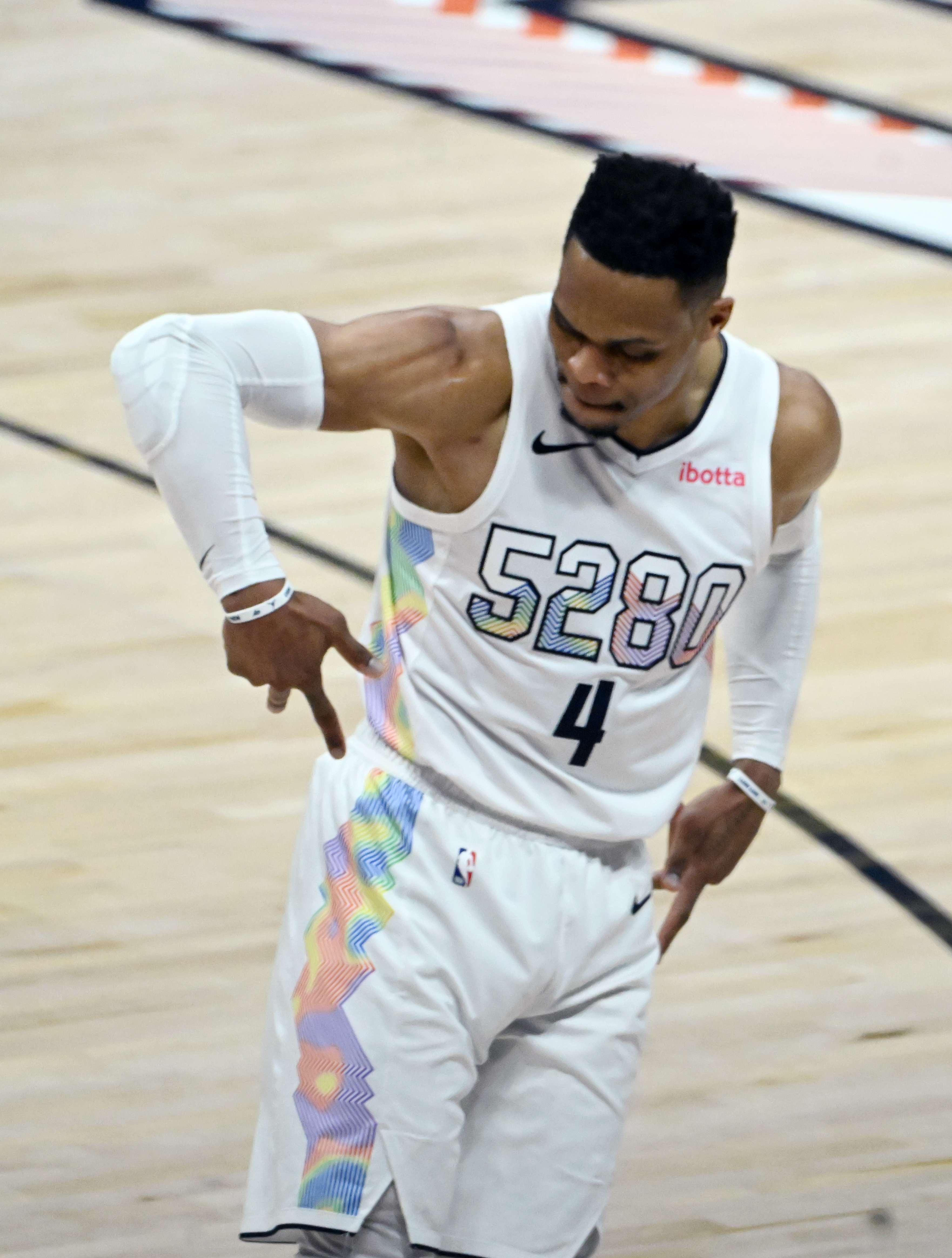 After shooting a three-pointer, Denver Nuggets guard Russell Westbrook (4) celebrates in front of the Clippers bench during the 2nd quarter of game 5 of the first round of the Western Championships at Ball Arena on Tuesday, April 29, 2025. (Jerilee Bennett,The Gazette)