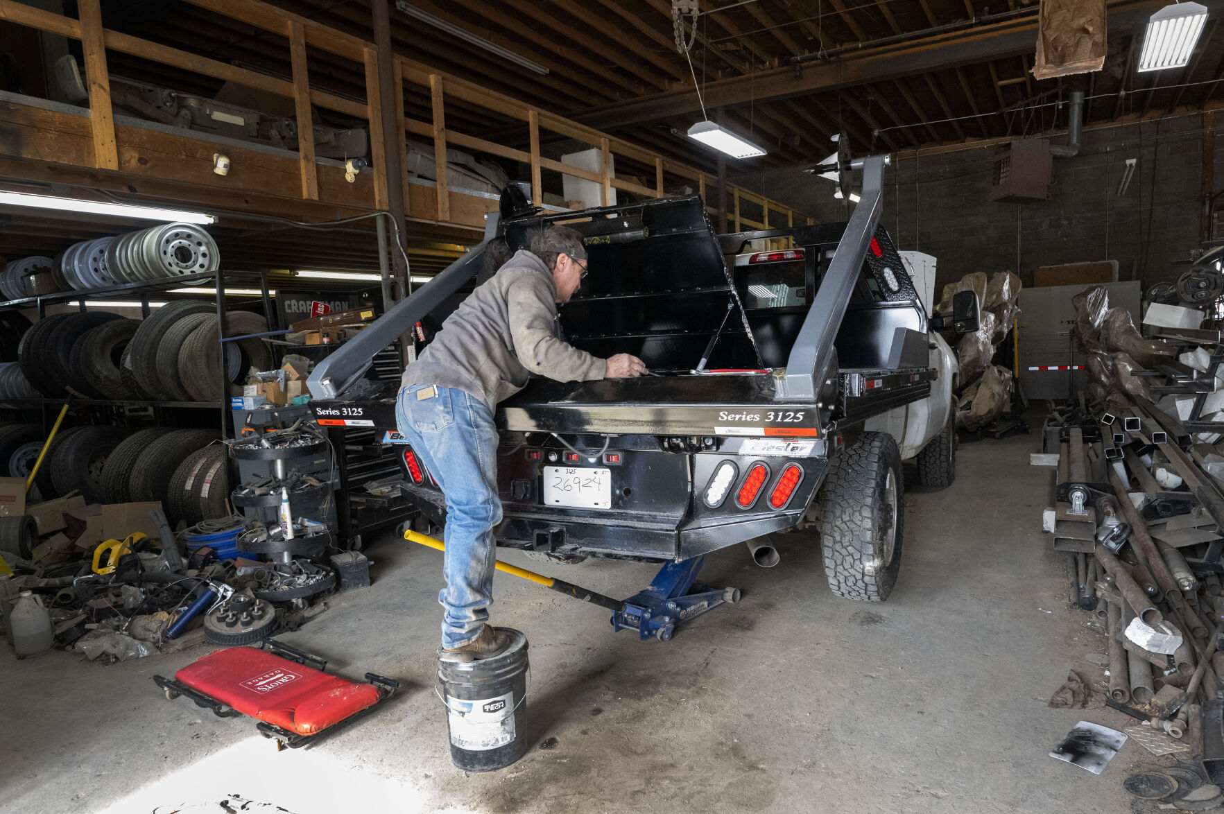 Glen Stagner installs a flatbed on a truck Tuesday, Feb. 4, 2025, at the family’s business, Stagner, Inc., in Lamar, Colo. (The Gazette, Christian Murdock) (Christian Murdock, The Gazette)