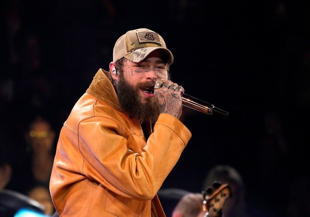 FILE — Post Malone performs a medley at the 57th Annual CMA Awards on Wednesday, Nov. 8, 2023, in Nashville, Tenn. (AP Photo/George Walker IV, File) (George Walker IV)