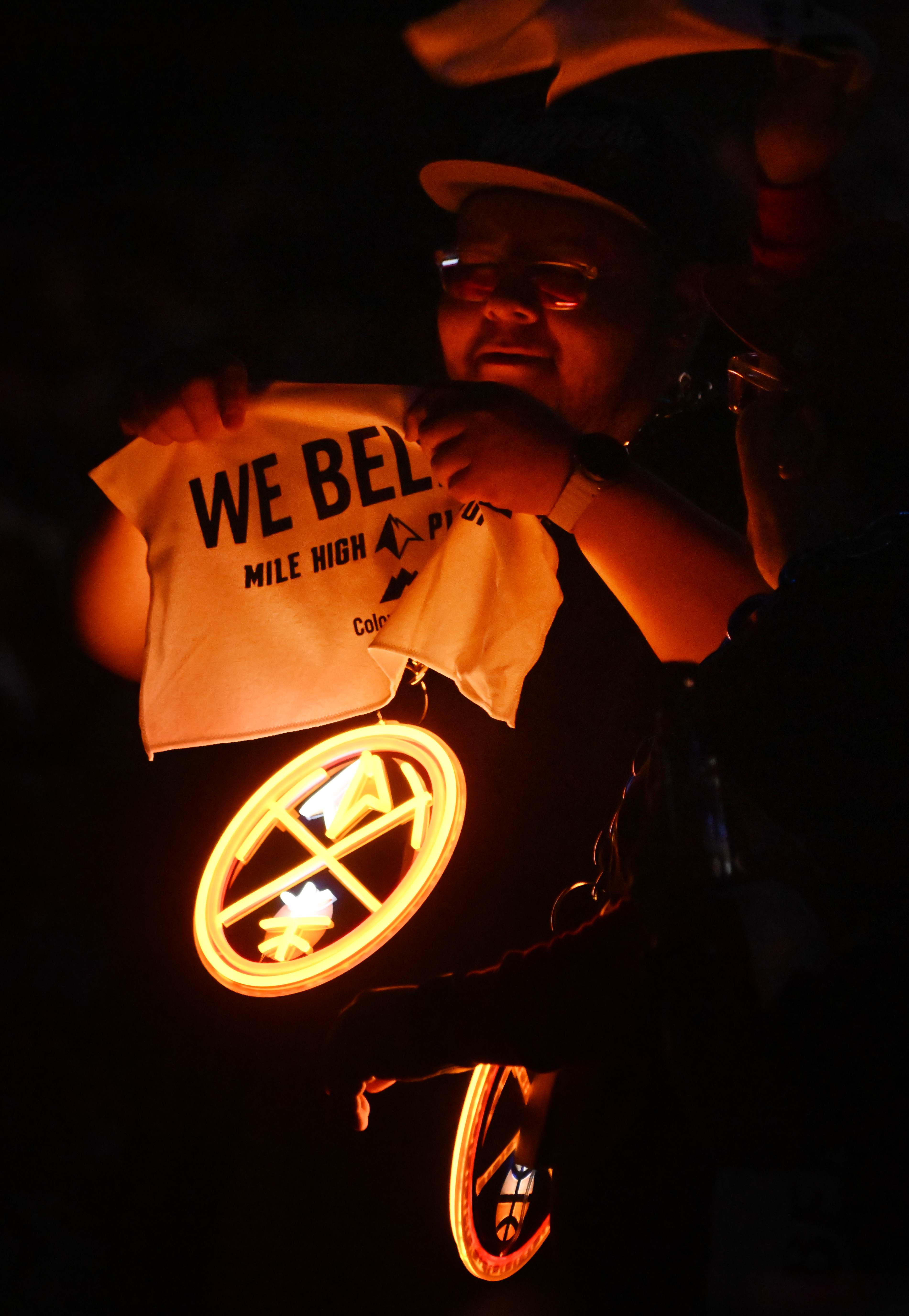 Fans glow in the dark during the team introductions before game 2 of Round 1 of the NBA Western Championship at Ball Arena on Monday, April 21, 2025. (Jerilee Bennett,The Gazette)