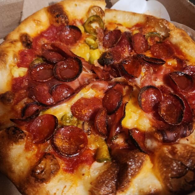 The P.W.A. pizza from Pizzeria Leopold features red sauce, cheese, pineapple, pepperoni, jalapeños, speck, pineapple chili marinated onions, pecorino Romano, and a drizzle of hot honey. (MarcoCummingsDigital Producermarco.cummings@denvergazette.comhttps://denvergazette.com/content/tncms/avatars/0/1d/eaa/01deaa56-19a7-11ee-95a9-eb824b1bc3f8.f5cab1faeccf1f82b4e43e1a242451a6.png)