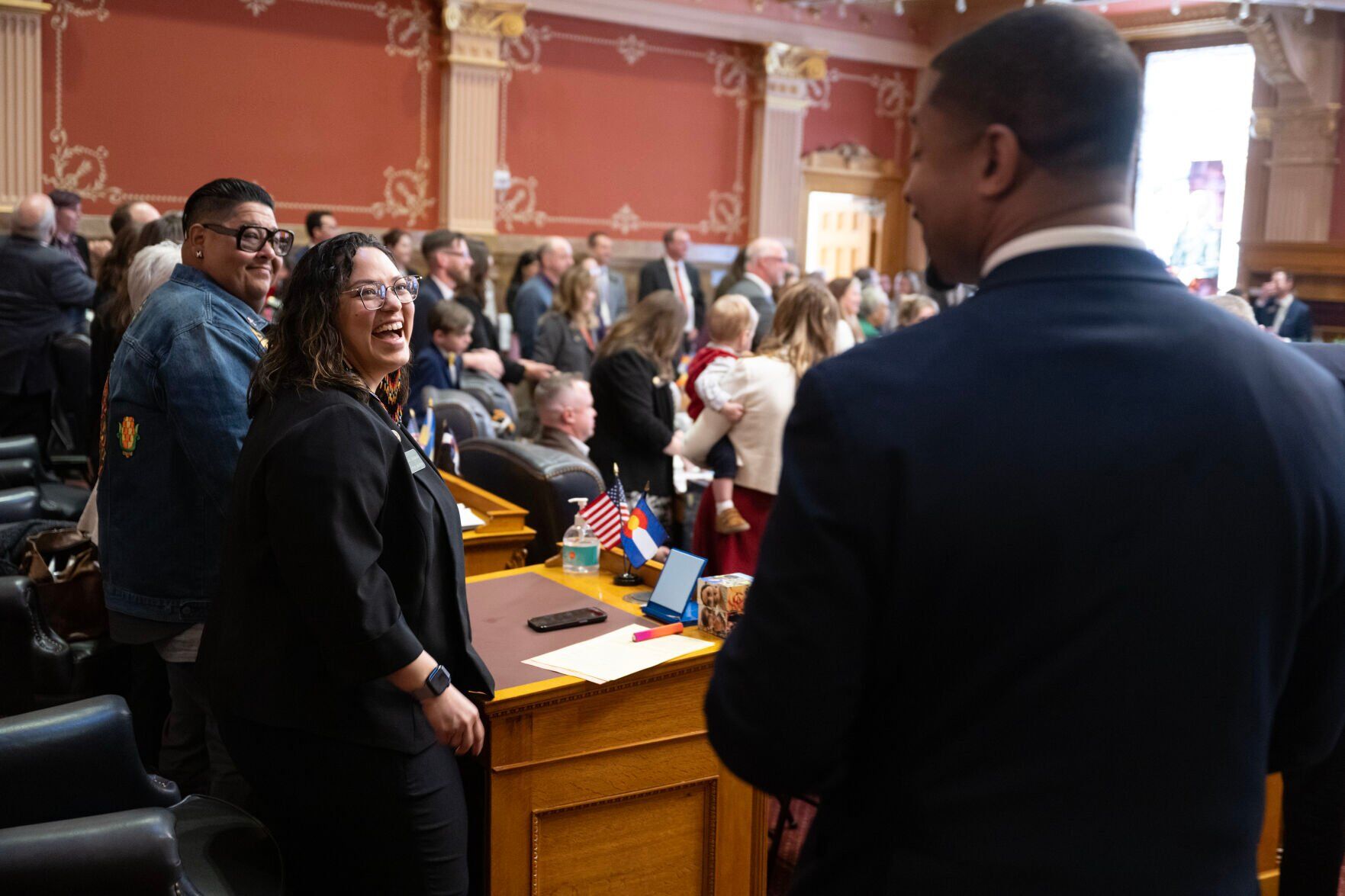 Sen. Julie Gonzales, left, laughs with Sen. James Coleman during the first day of Colorado’s 2024 legislative session. (TimHursttim.hurst@gazette.comhttps://secure.gravatar.com/avatar/aca82bd62b4ee425c598527cd6faa1b1?d=mm&r=g)