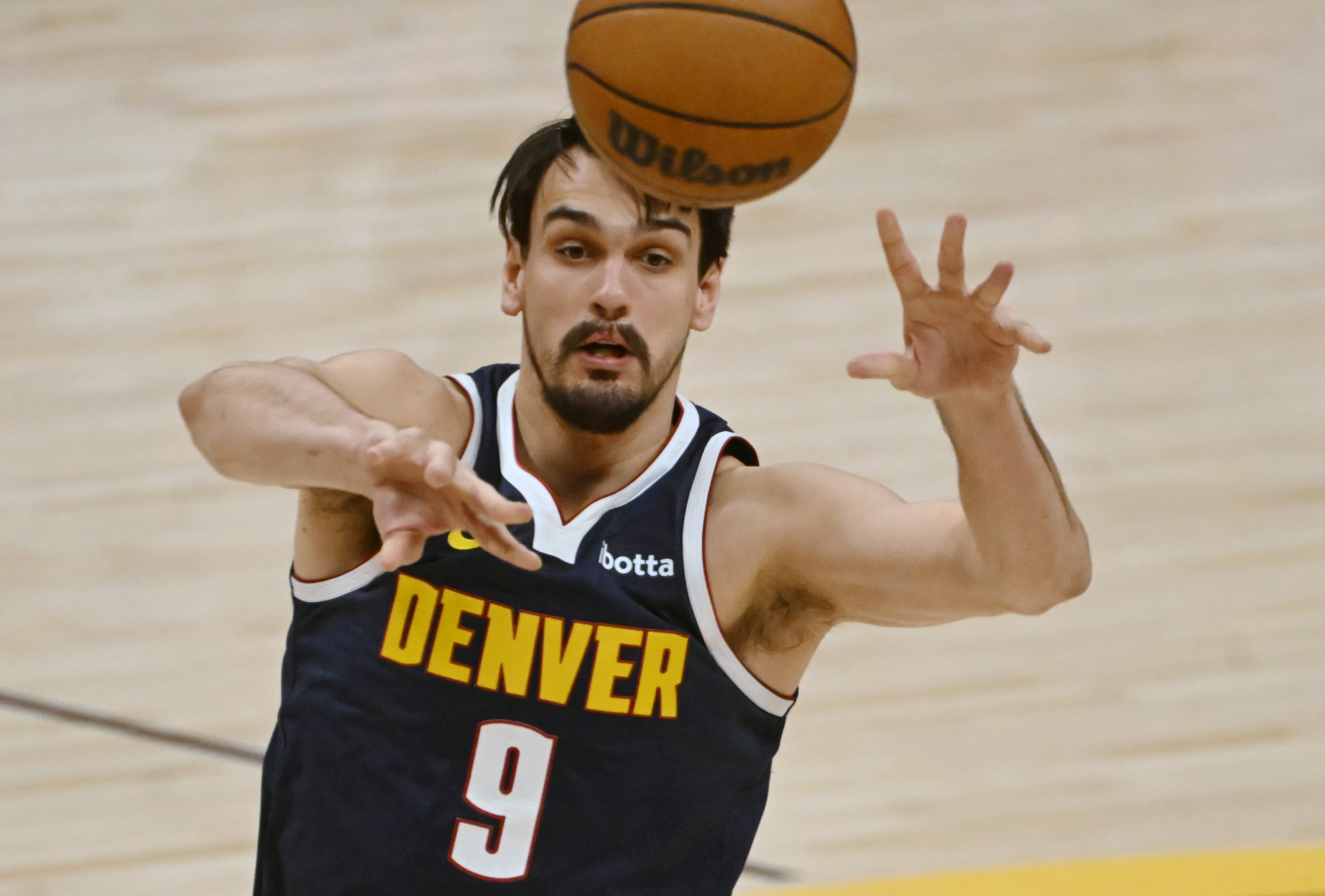 Denver Nuggets forward Dario Saric (9) passes the ball during a game against the Spurs at Ball Arena on Thursday, April 3, 2025. (Jerilee Bennett, The Gazette)