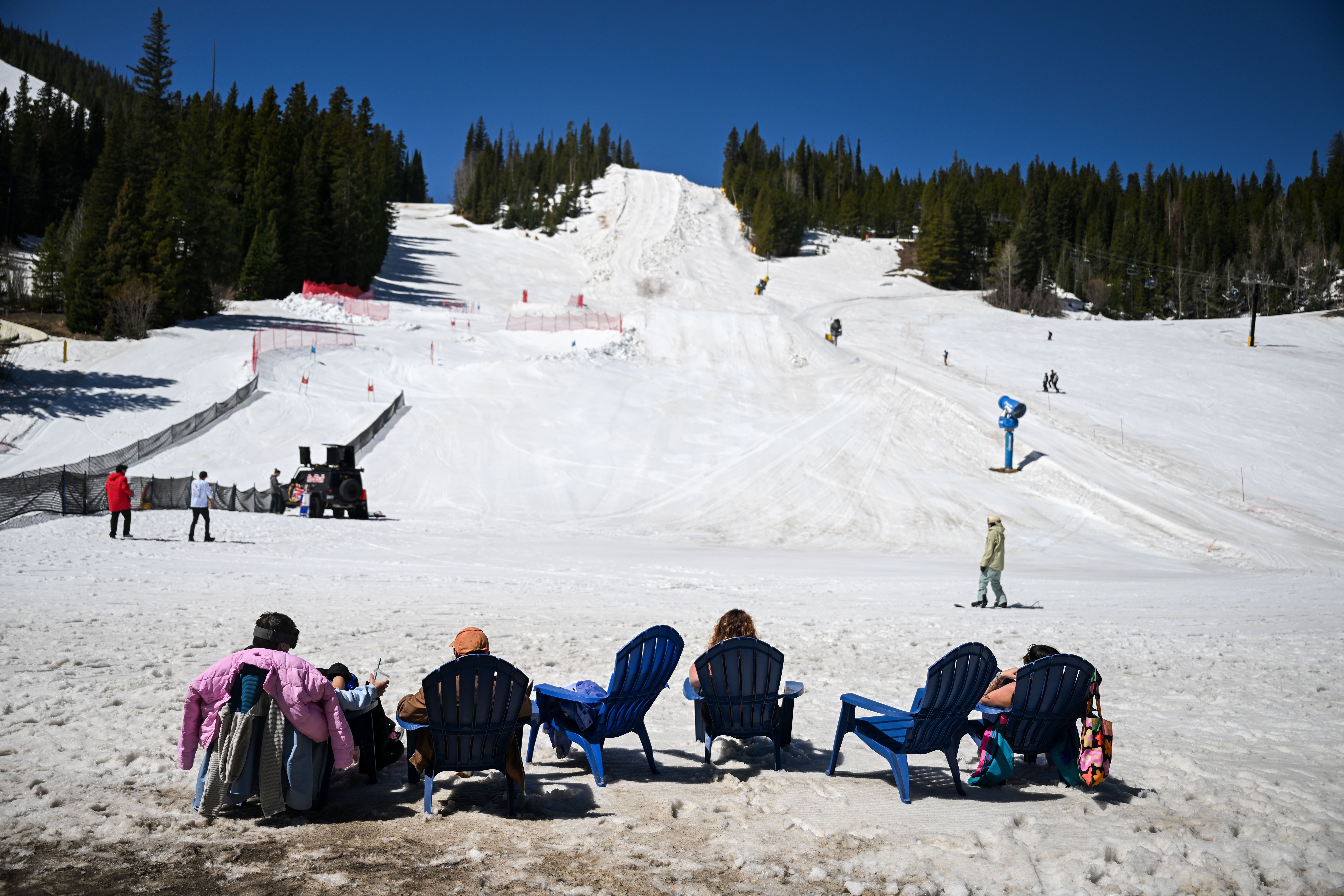People relax in lawn chairs at the base of Winter Park before the start of the Spring Splash event to celebrate the last day of the season on Sunday, April 27, 2025. The event had competitors ski and snowboard across a pool of water at the base of the mountain in colorful costumes. (Stephen Swofford, Denver Gazette) (StephenSwoffordPhotographerstephen.swofford@gazette.comhttps://secure.gravatar.com/avatar/1ddcaf11c5d70eaa58546ddc4e038687?d=mm&r=g)