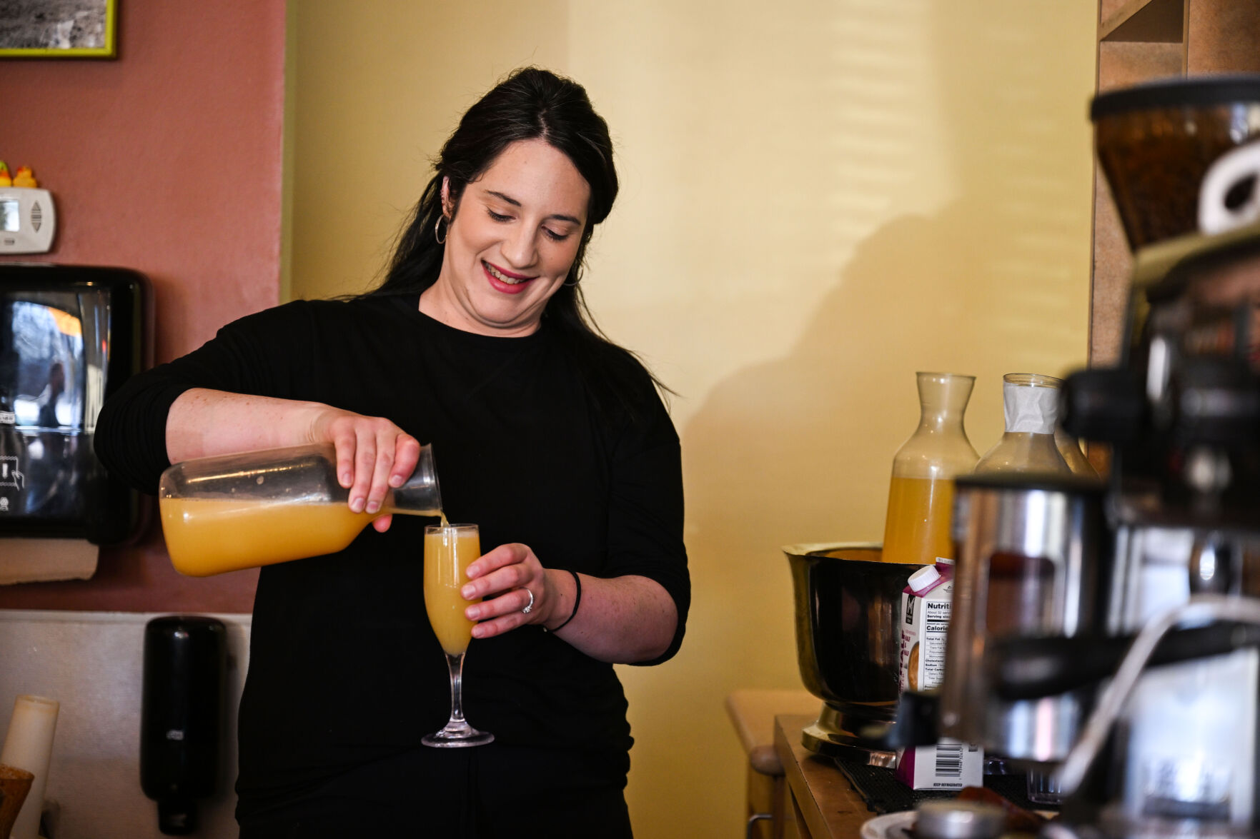 Maggie Nicola, the Manager and bartender at Breakfast on Broadway in Englewood, pours a drink for a customer on Tuesday, March 25, 2025. (Stephen Swofford, Denver Gazette) (StephenSwoffordPhotographerstephen.swofford@gazette.comhttps://secure.gravatar.com/avatar/1ddcaf11c5d70eaa58546ddc4e038687?d=mm&r=g)