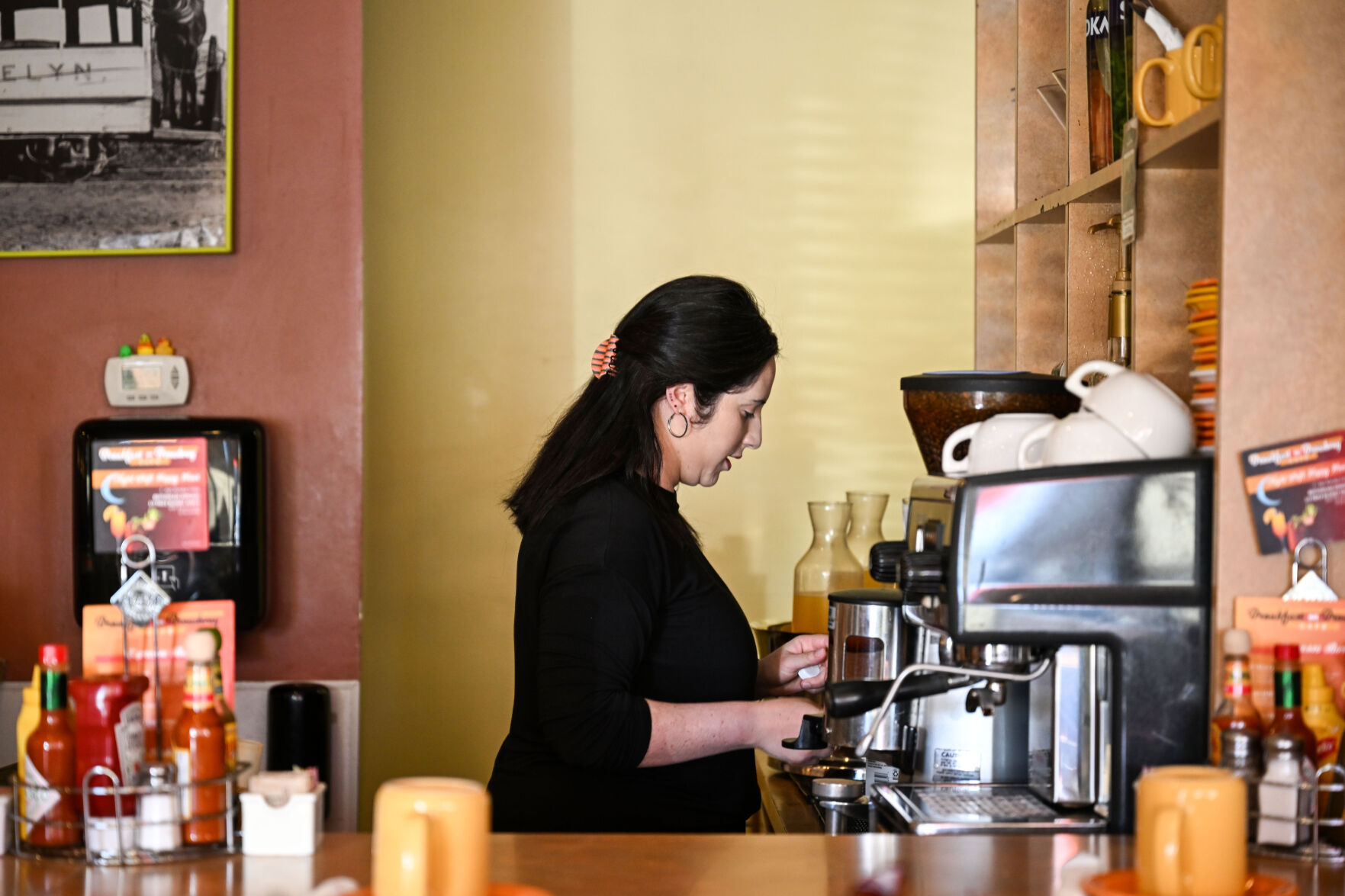 Maggie Nicola, the Manager and bartender at Breakfast on Broadway in Englewood, pours a drink for a customer on Tuesday, March 25, 2025. (Stephen Swofford, Denver Gazette) (StephenSwoffordPhotographerstephen.swofford@gazette.comhttps://secure.gravatar.com/avatar/1ddcaf11c5d70eaa58546ddc4e038687?d=mm&r=g)