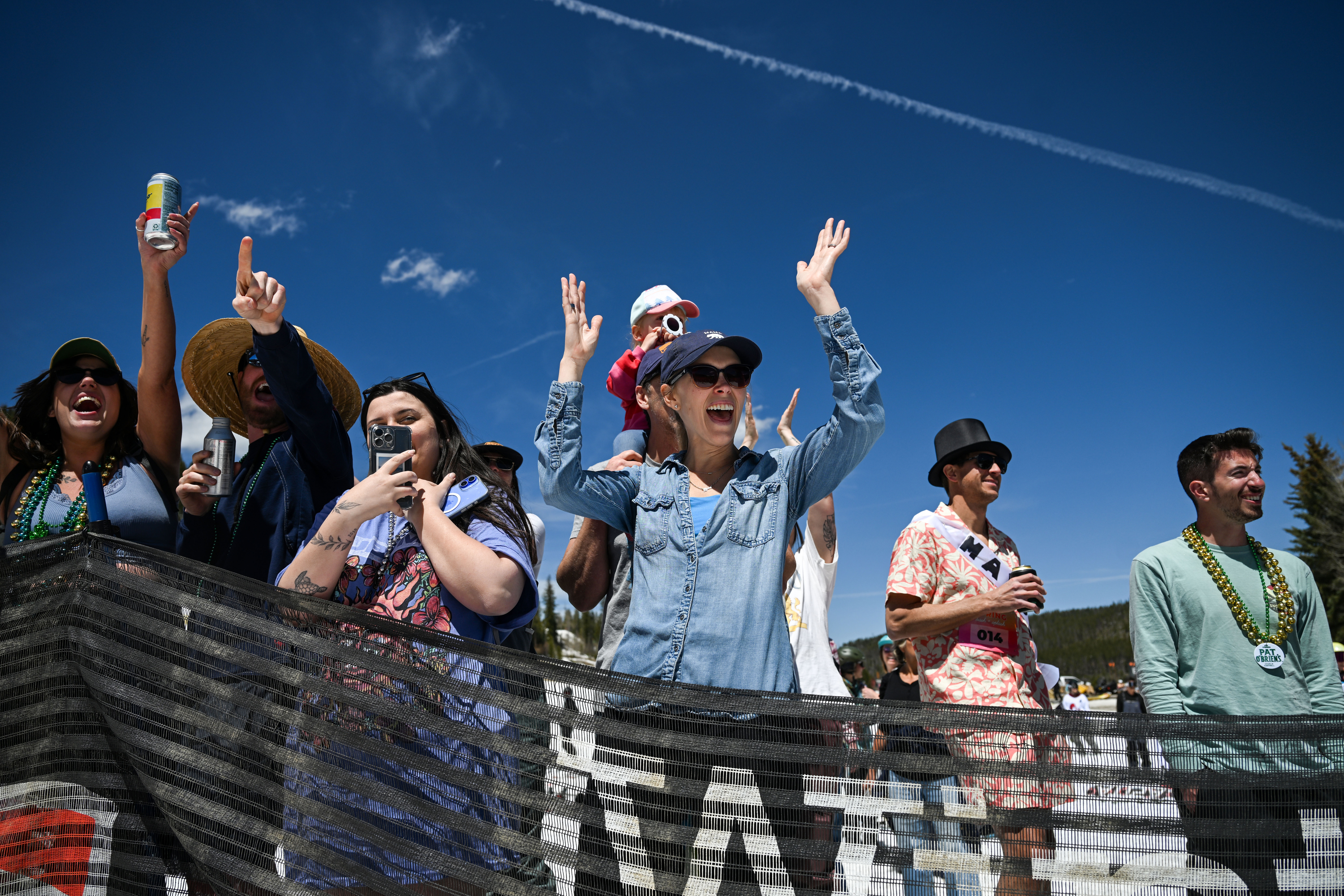 A crowd watches competitors attempt to ski and snowboard across a pool of water at the base of Winter Park during the Spring Splash event to celebrate the last day of the season on Sunday, April 27, 2025 (Stephen Swofford, Denver Gazette) (StephenSwoffordPhotographerstephen.swofford@gazette.comhttps://secure.gravatar.com/avatar/1ddcaf11c5d70eaa58546ddc4e038687?d=mm&r=g)