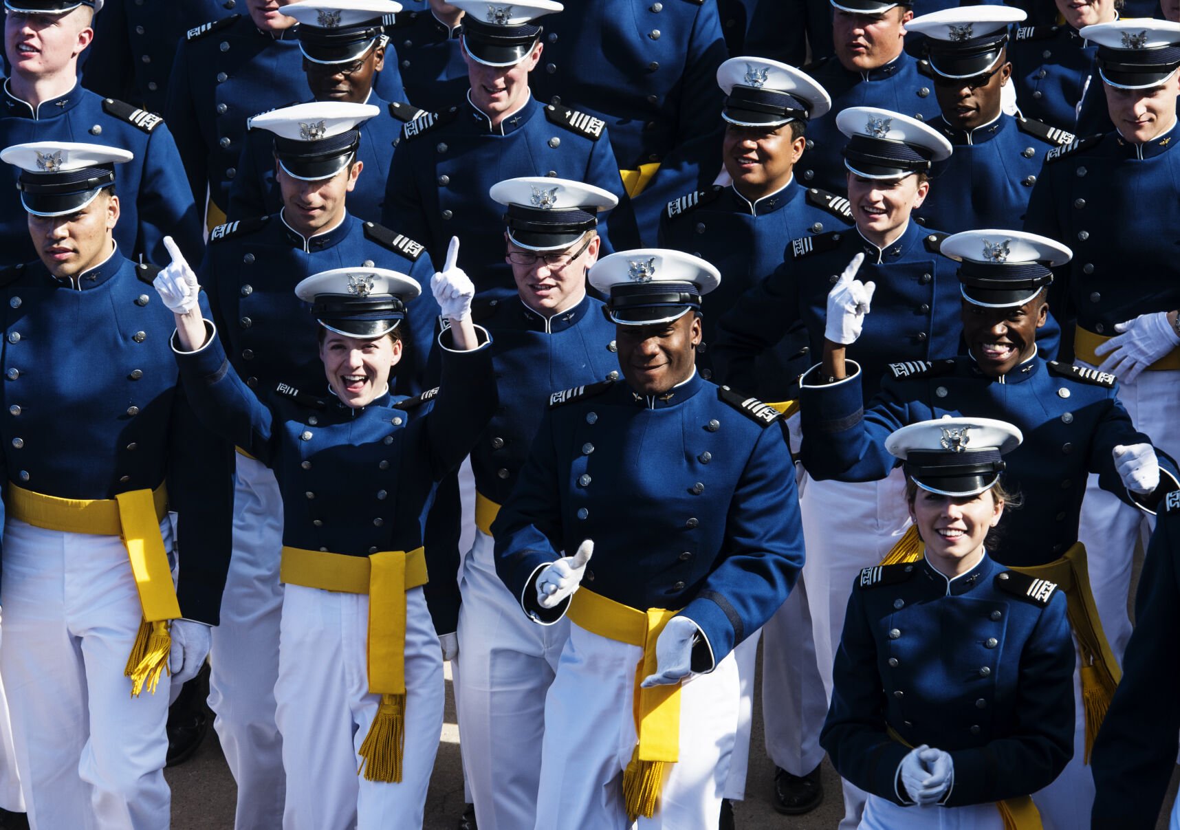 Cadets cheer as they enter the tunnel before the 2018 Air Force Academy commencement ceremony in Colorado Springs. (the Gazette file)