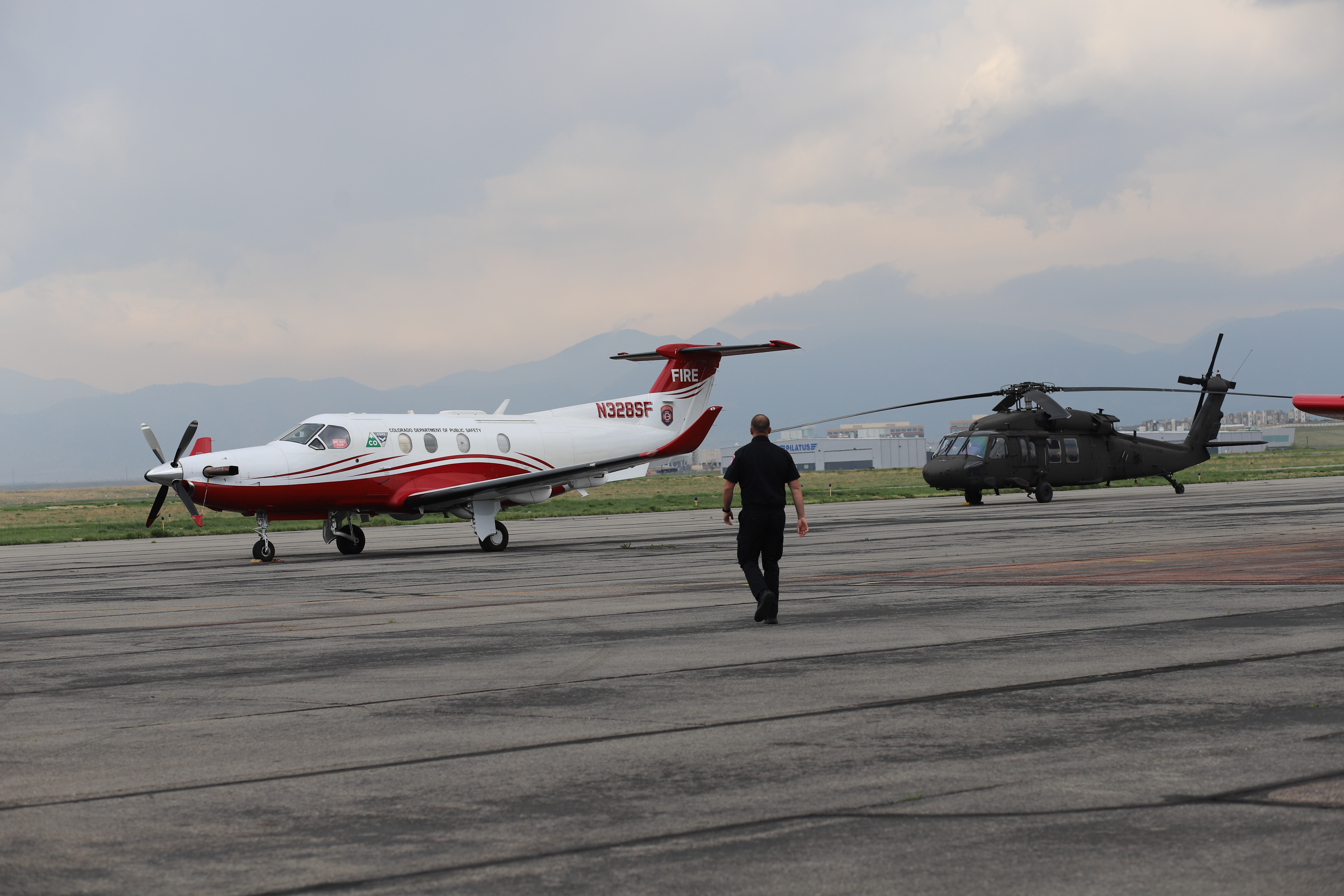 A fire official walks toward a Colorado Department of Public Safety fire plane in Broomfield on April 24, 2025. (KylaPearceAurora reporterkyla.pearce@denvergazette.comhttps://denvergazette.com/content/tncms/avatars/2/16/1e5/2161e54a-3f47-11ed-bc0c-ff41892600ae.4fb8f678b9b96eab286c33c5af828fe7.png)