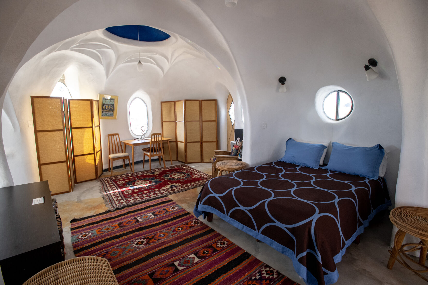 RIGHT: The Crestone Hobbitat features one bedroom, a living room, a reading space, kitchen and a meditation room. (Parker Seibold)