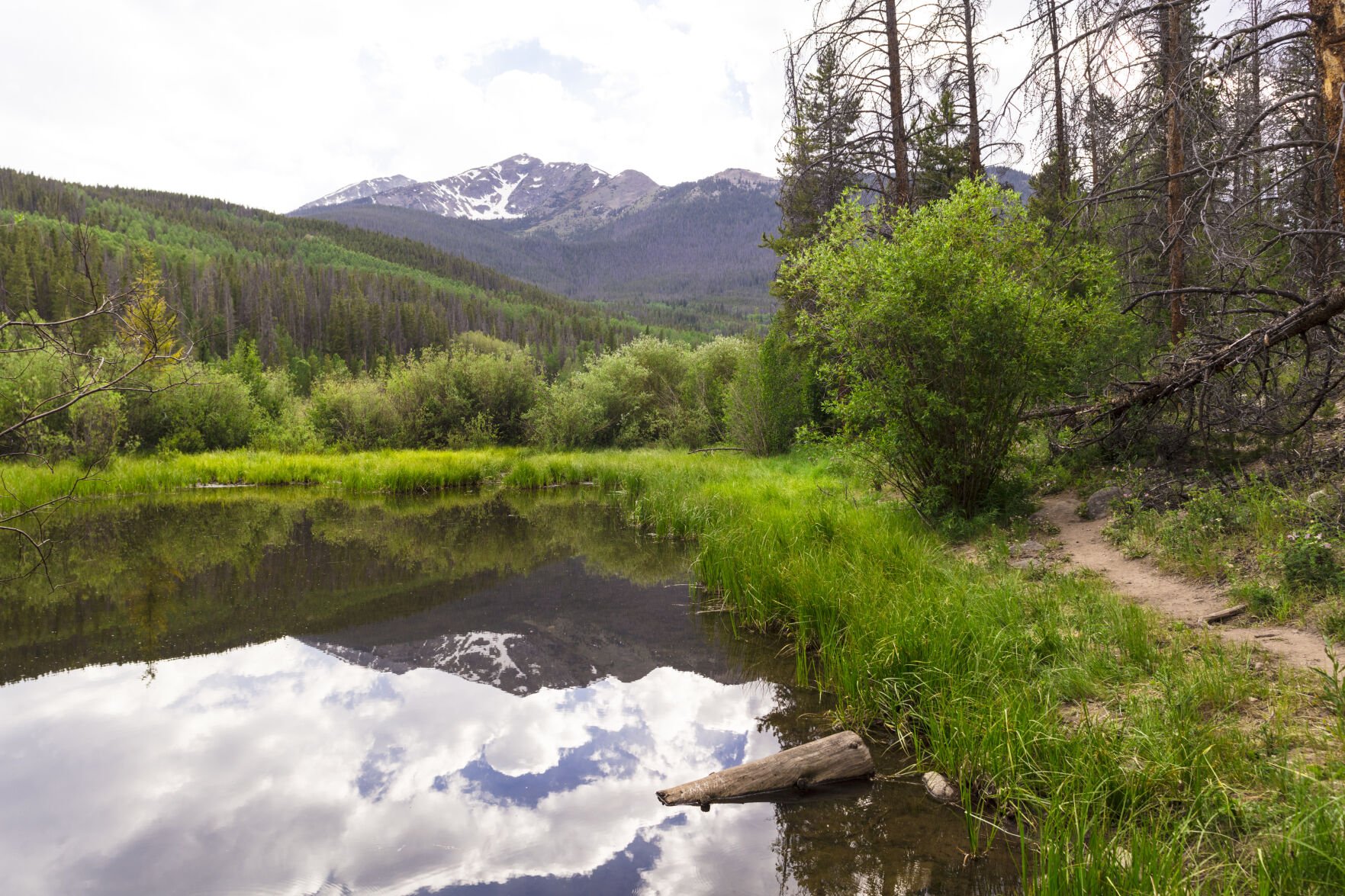 A trail runs by Rainbow Lake outside Frisco. (Photo by Joe Kusumoto, Town of Frisco)