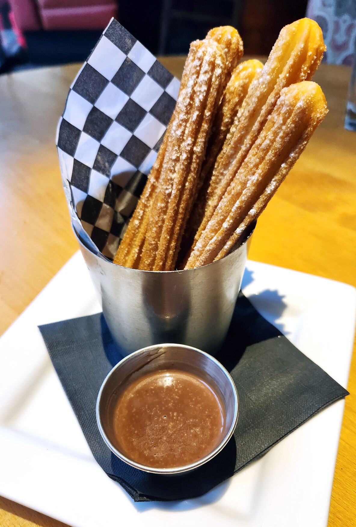 Churros and hot chocolate dipping sauce at The 9th Door in Denver. -Robin Intemann/ The Gazette