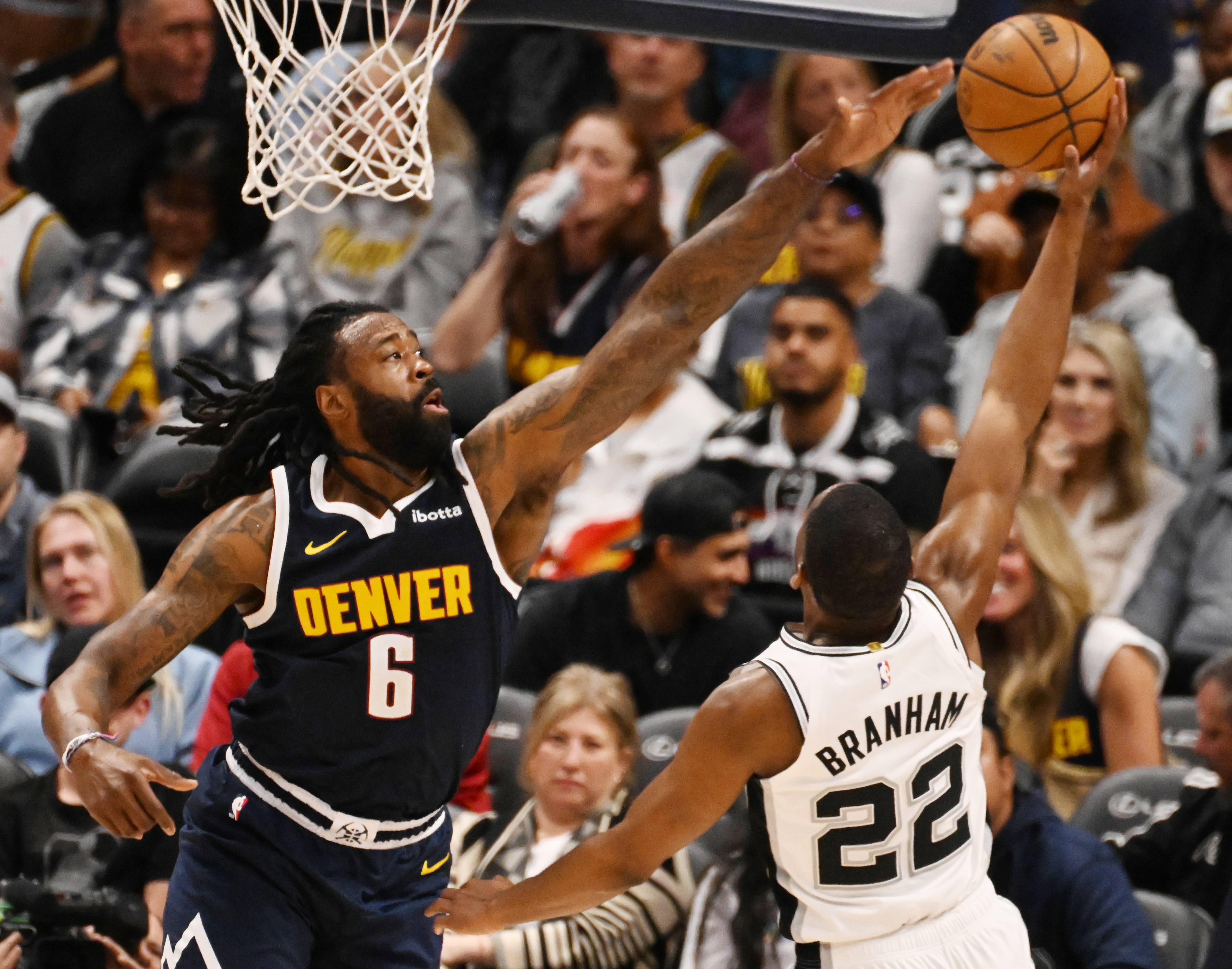 Denver Nuggets center DeAndre Jordan (6) defends the ball during a game against the Spurs at Ball Arena on Thursday, April 3, 2025. (Jerilee Bennett,The Gazette)