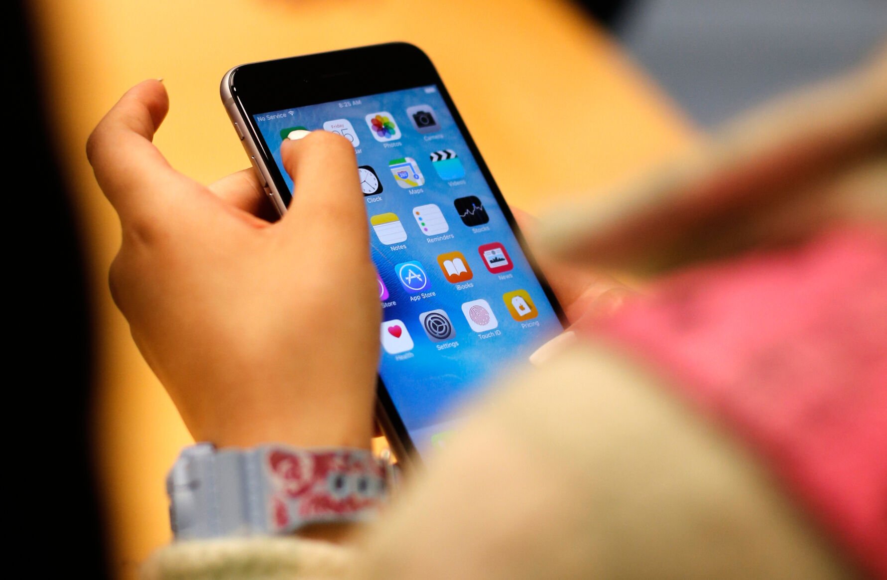 FILE - A child holds an iPhone at an Apple store on Sept. 25, 2015 in Chicago. (AP Photo/Kiichiro Sato, File) (LuigeDel PuertoManaging Editorluige.delpuerto@gazette.comhttps://secure.gravatar.com/avatar/766fd31de2cd272e966b7901a72100e4?d=mm&r=g)