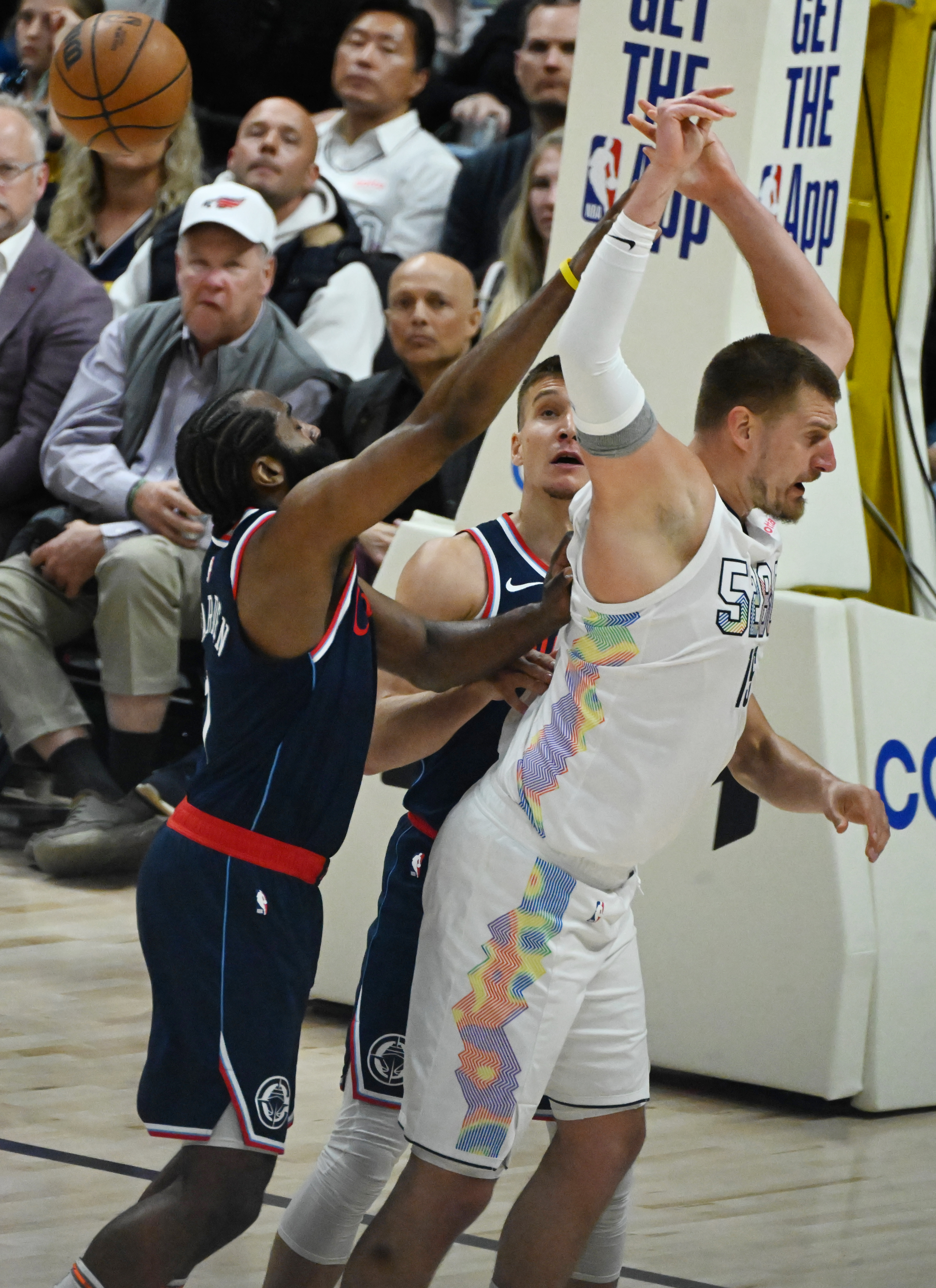 Denver Nuggets center Nikola Jokic (15) makes a no-look behind the back pass to Peyton Watson during the 3rd quarter of game 5 of the first round of the Western Championships at Ball Arena on Tuesday, April 29, 2025. (Jerilee Bennett, The Gazette)