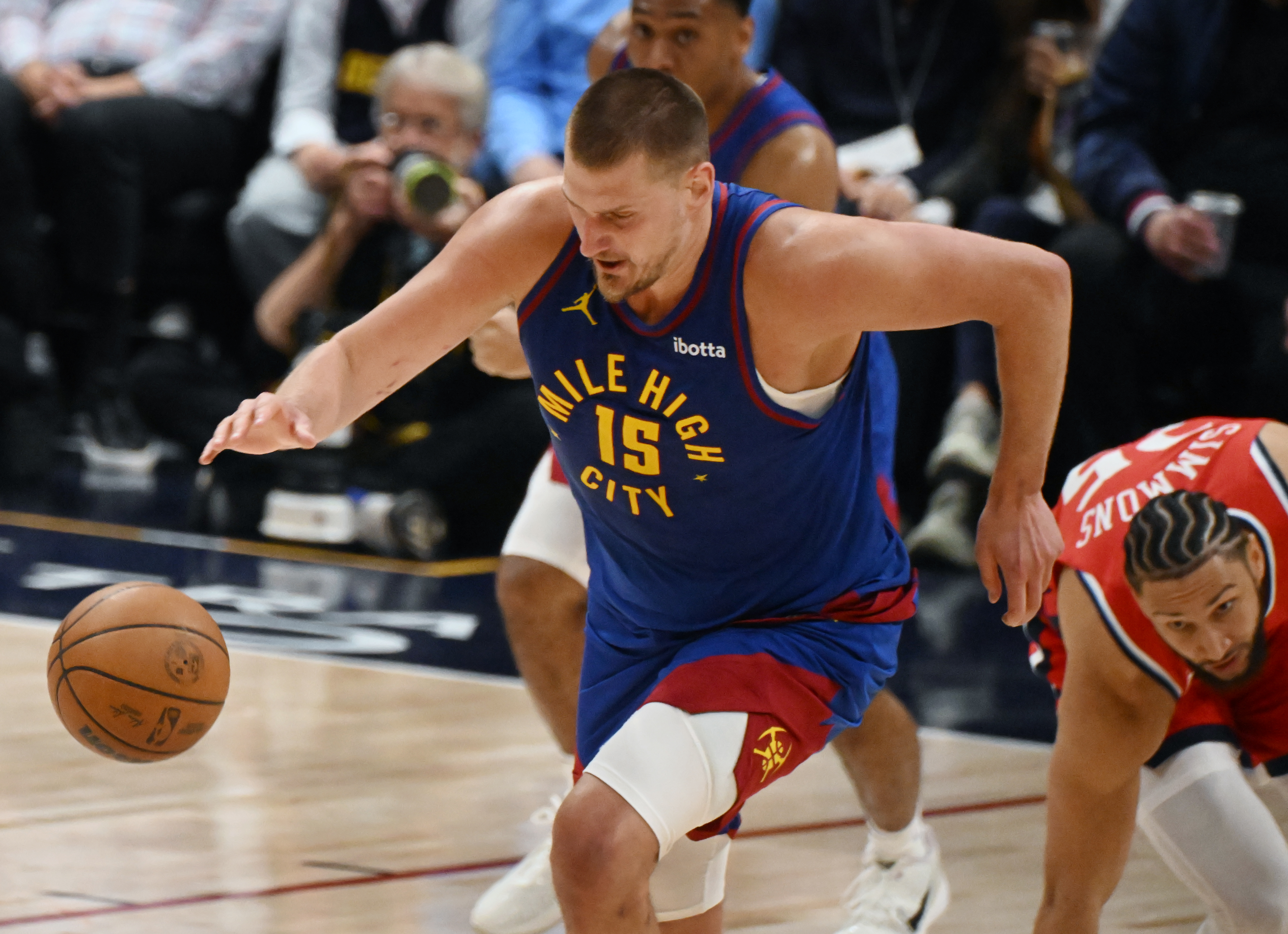 After stealing the ball from Clippers Ben Simmons, Nikola Jokic takes off with the ball in the 3rd quarter of the first series of the NBA playoffs at Ball Arena on Saturday, April 19, 2025. The Nuggets won the game in overtime 112-110. (Jerilee Bennett,The Gazette)