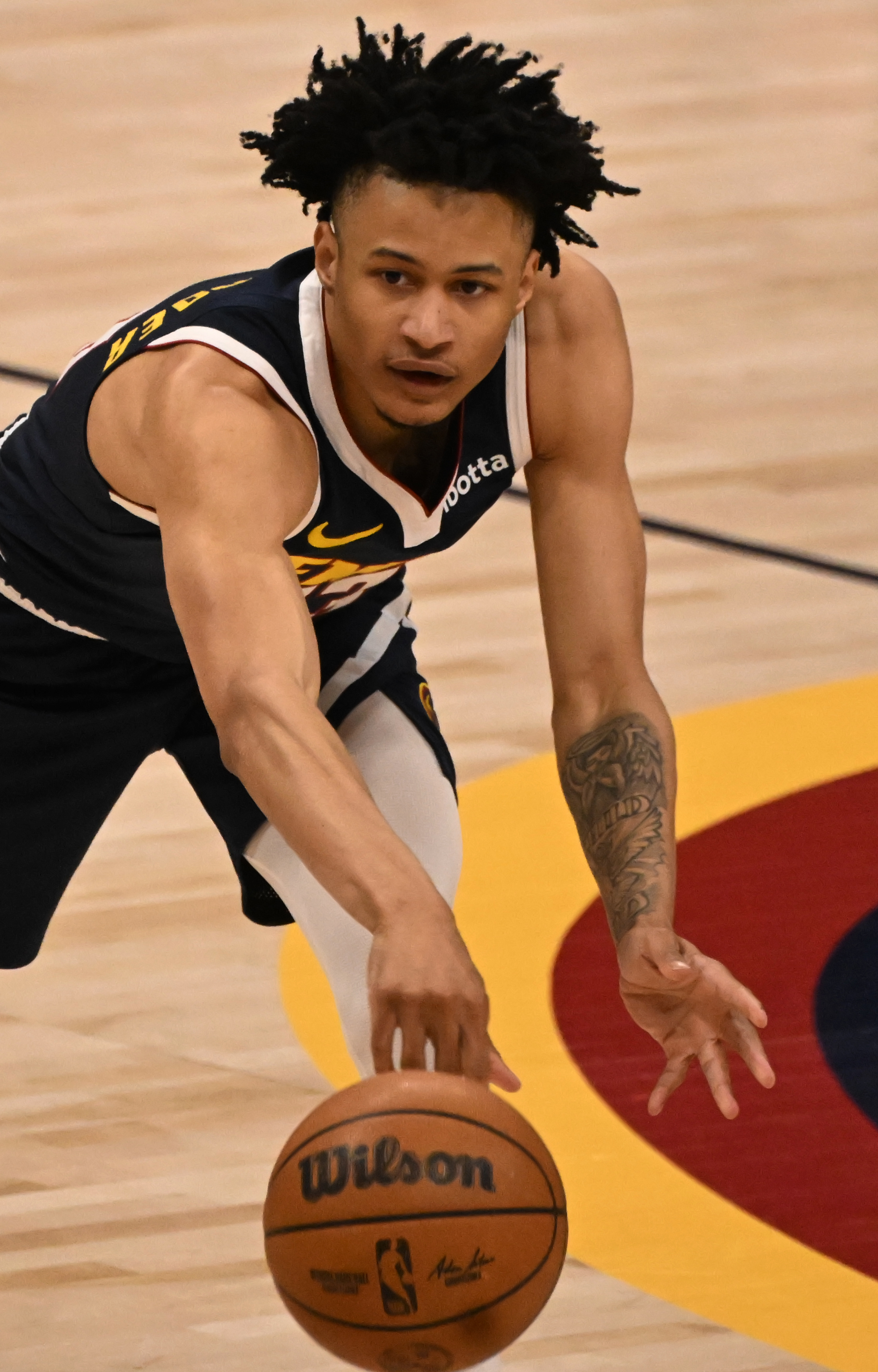 Denver Nuggets guard Trey Alexander (23) passes the ball during a game against the Spurs at Ball Arena on Thursday, April 3, 2025. (Jerilee Bennett,The Gazette)