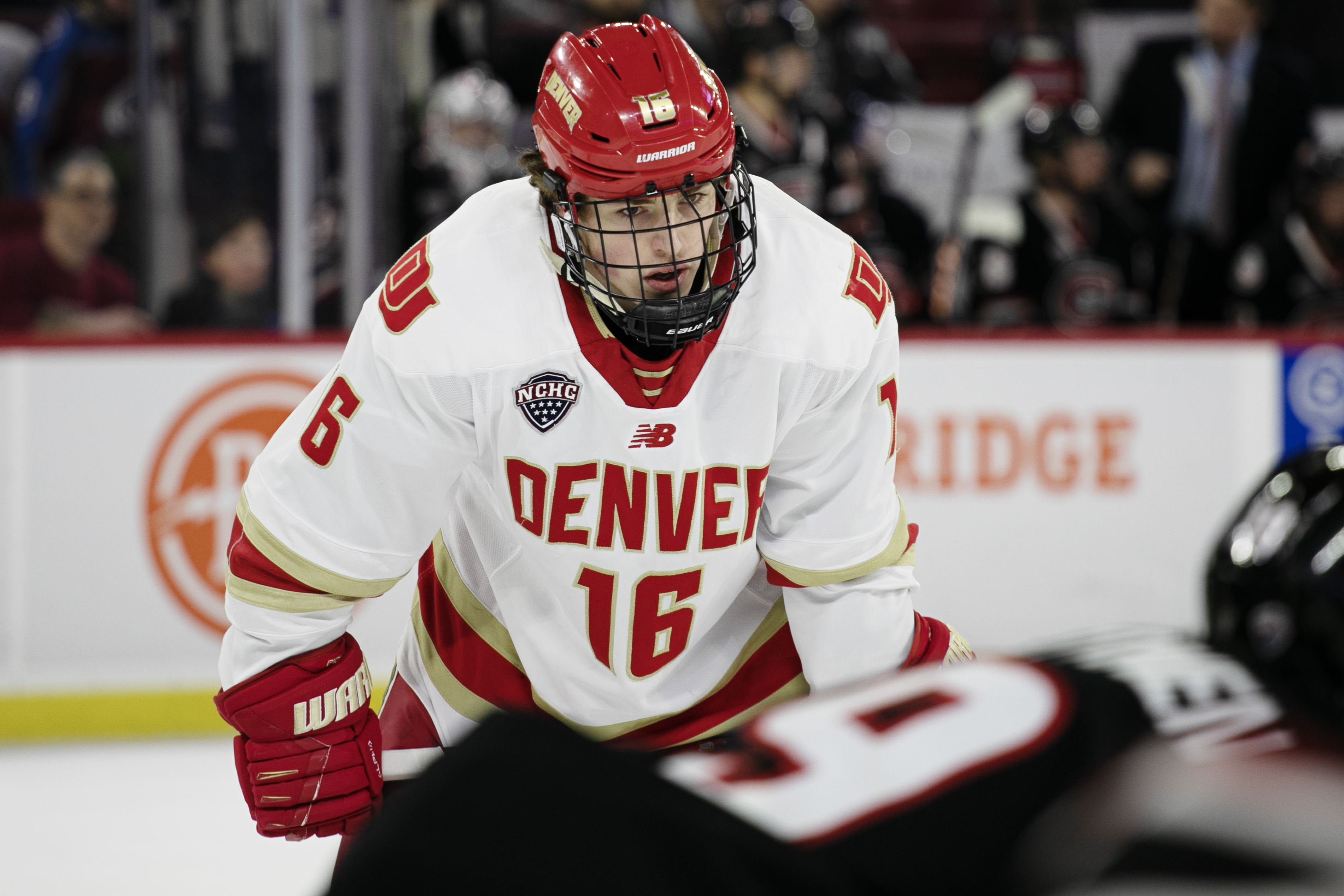 Denver junior forward Tristan Broz (16) focuses in on a faceoff in the third period of a game against St. Cloud State on Jan. 13 in at Magness Arena in Denver. (TomHellauerMultimedia Producertom.hellauer@denvergazette.comhttps://denvergazette.com/content/tncms/avatars/f/9e/622/f9e6228a-3b6b-11ed-bf10-fbb71fa8e421.f54b911252c540f1d61709edc4727a39.png)