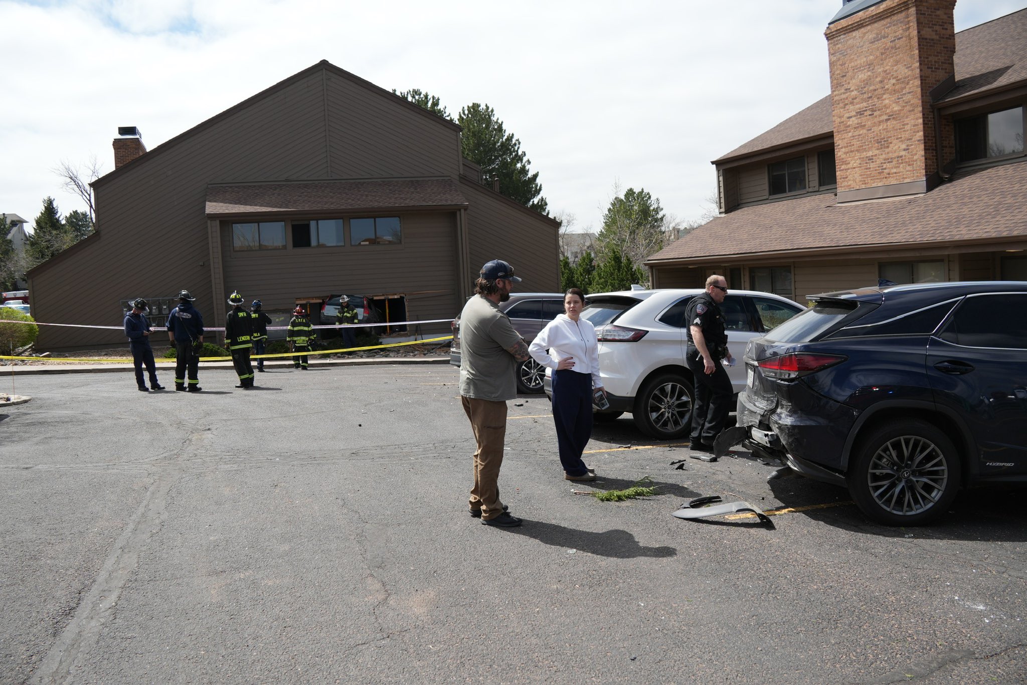 South Metro Fire Rescue crews and others inspect the scene of a vehicle that crashed into multiple buildings in Centennial, Colorado Monday, April 14, 2025. (Courtesy, South Metro Fire Rescue)