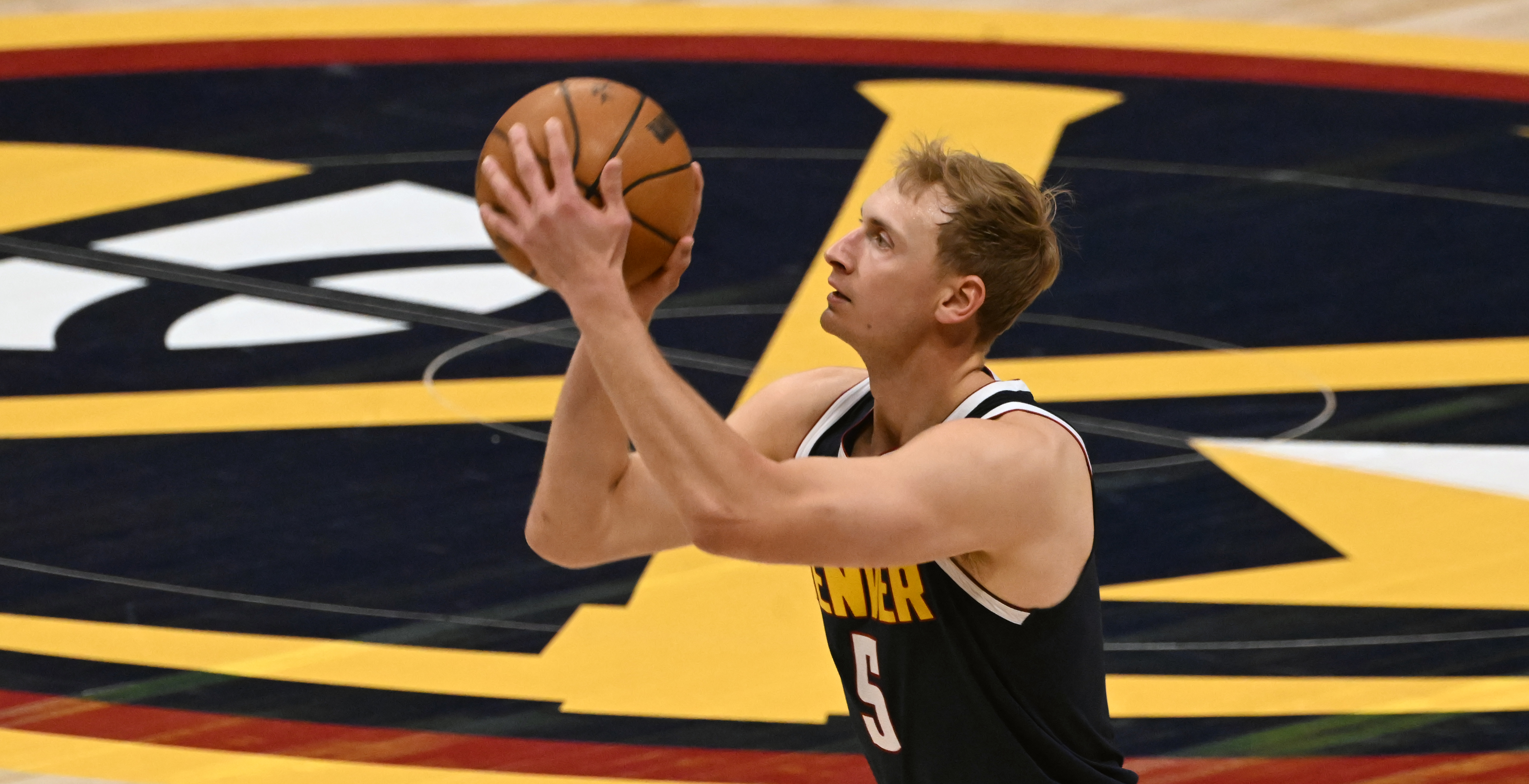 Denver Nuggets forward Hunter Tyson (5) shoots the ball during a game against the Spurs at Ball Arena on Thursday, April 3, 2025. (Jerilee Bennett,The Gazette)