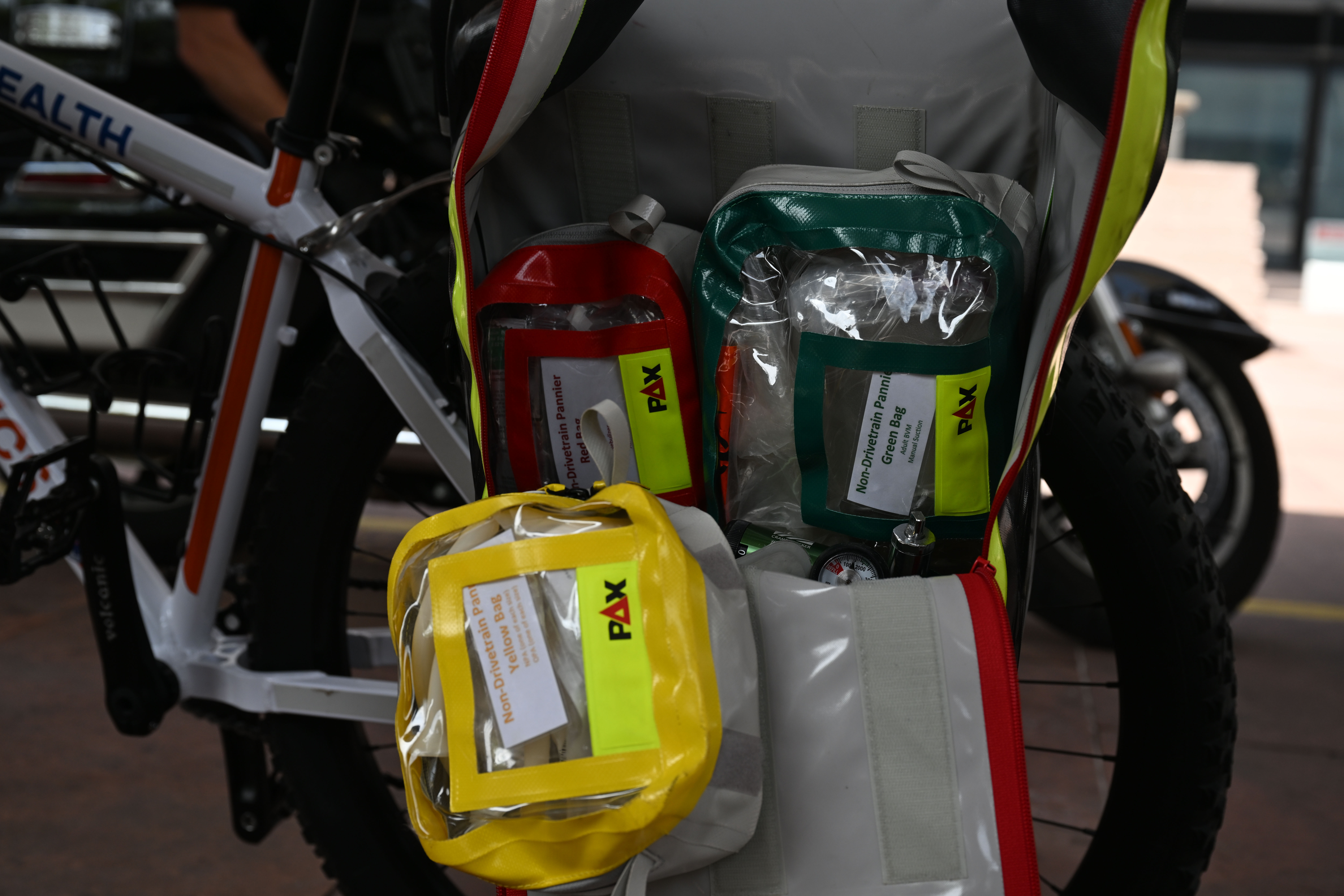 A bag filled with medical equipment hangs on the side of a mountain bike equipped for paramedic response throughout the downtown area. The bike team, established in 1991, is capable of reaching areas inaccessible by ambulance so paramedics can respond faster and better to emergencies during crowded events. (Stephen Swofford, Denver Gazette) (StephenSwoffordPhotographerstephen.swofford@gazette.comhttps://secure.gravatar.com/avatar/1ddcaf11c5d70eaa58546ddc4e038687?d=mm&r=g)