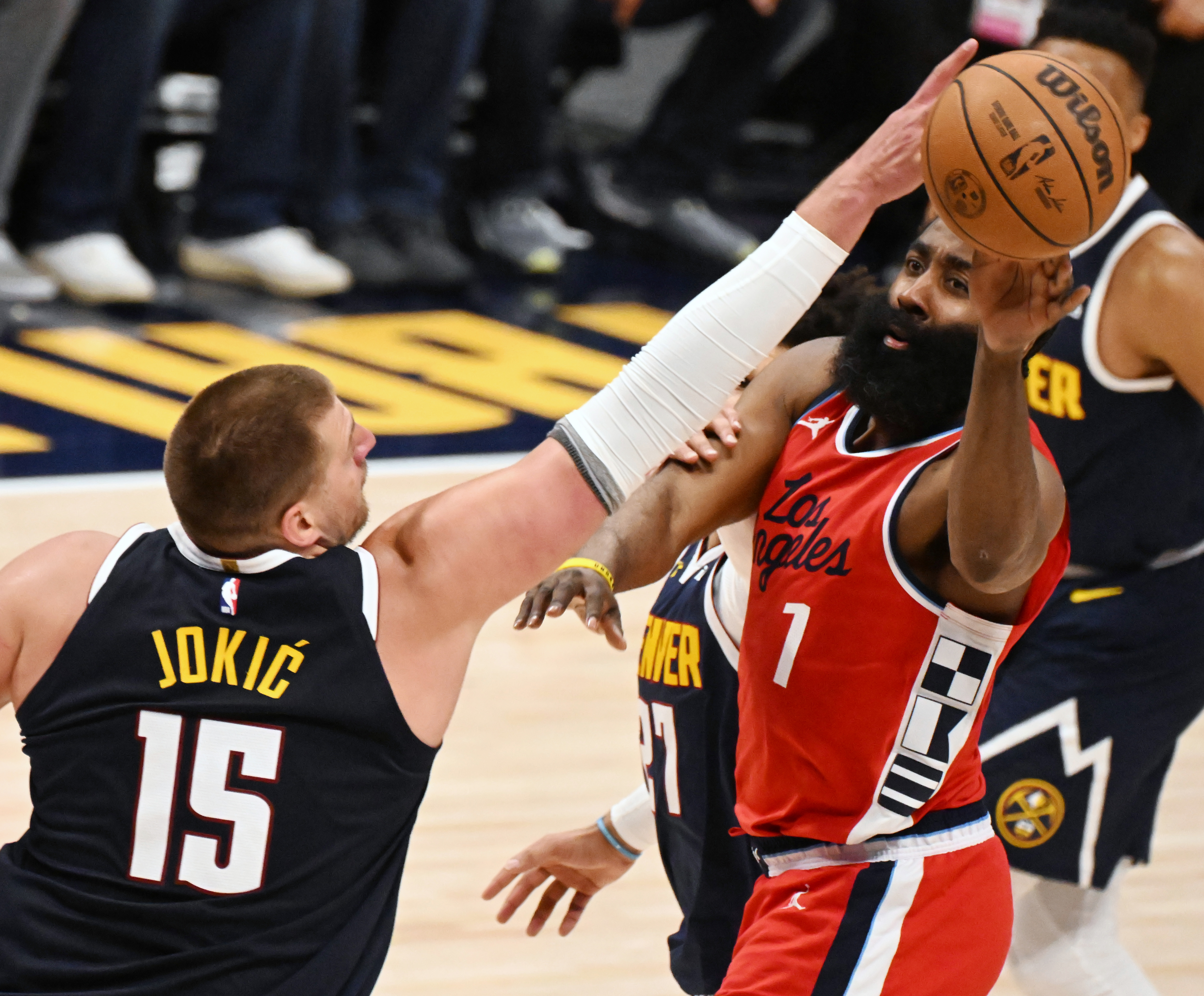 Denver Nuggets center Nikola Jokic (15) defends LA Clippers guard James Harden (1) during the 4th quarter of game 2 of Round 1 of the NBA Western Championship at Ball Arena on Monday, April 21, 2025. (Jerilee Bennett, The Gazette)