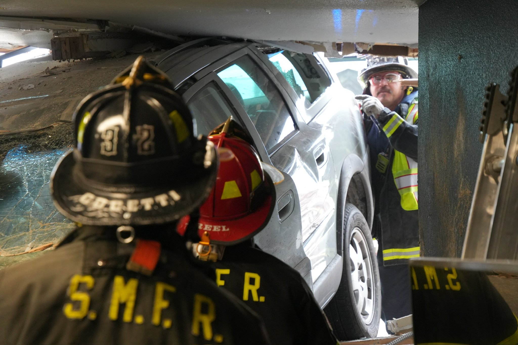 South Metro Fire Rescue crews inspect a vehicle that crashed into multiple buildings in Centennial, Colorado Monday, April 14, 2025. (Courtesy, South Metro Fire Rescue)