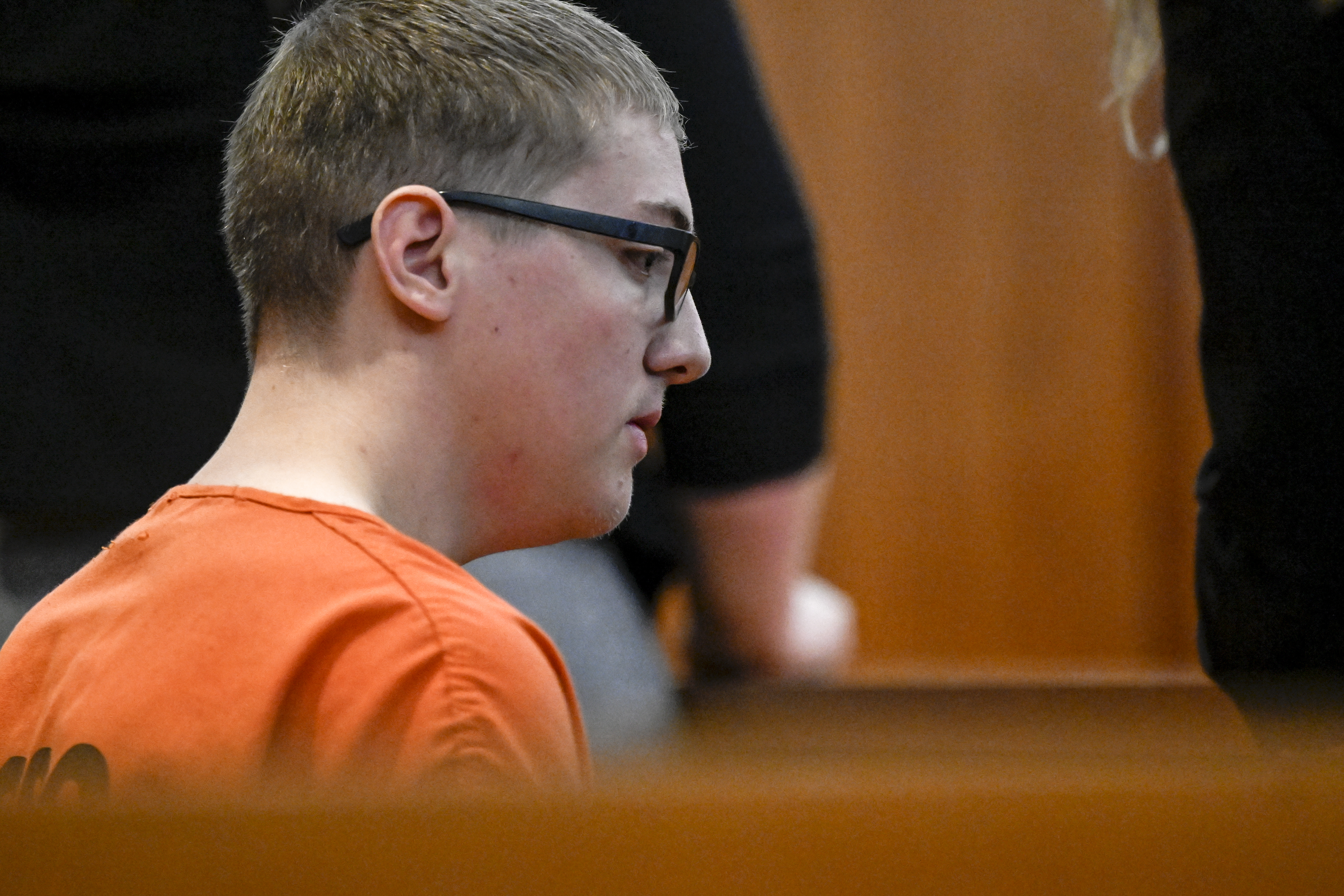 FILE PHOTO: Defendant Nicholas “Mitch” Karol-Chik listens to First Judicial District Court Judge Christopher Zenisek as Karol-Chik is formally charged with first-degree murder, attempted murder, assault and attempted assault, in Jefferson County court on Wednesday, May 3, 2023. Karol-Chik, Zachary Kwak and Joseph Koenig are accused of throwing landscaping rocks from an overpass onto oncoming cars in Westminster, resulting in the death of 20-year-old Alexa Bartell. The three defendants face life in prison without the possibility of parole if convicted of first-degree murder in the death of Bartell. (Photo by AAron Ontiveroz/The Denver Post/Pool) (AAron Ontiveroz/Denver Post/Pool)