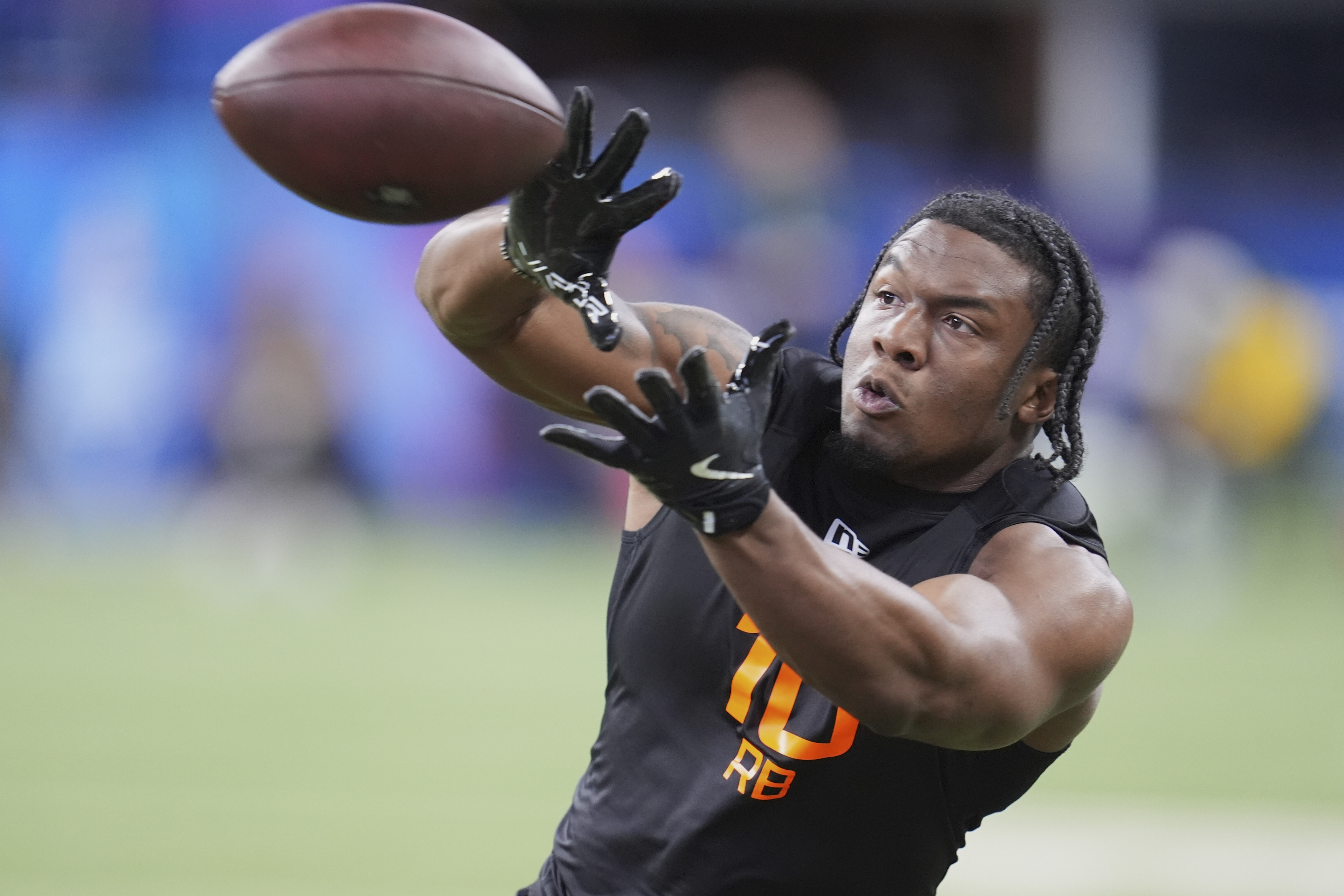 Central Florida running back RJ Harvey runs a drill at the NFL football scouting combine in Indianapolis, Saturday, March 1, 2025. (AP Photo/Michael Conroy) (Michael Conroy)