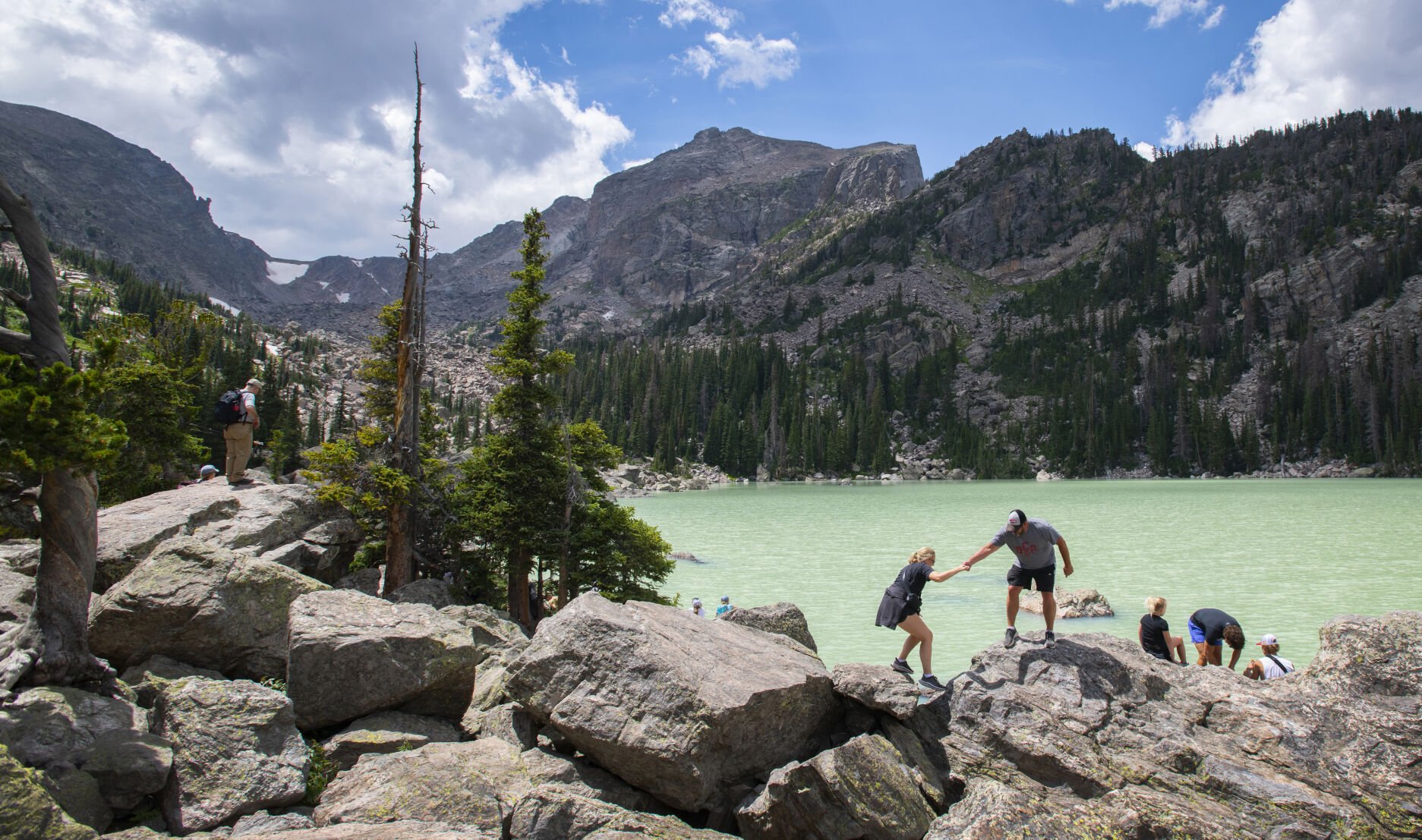 Hikers explore Lake Haiyaha Wednesday, July 27, 2022, in Rocky Mountain National Park in Colorado. According to NPS data, 4.1 million visitors in 2023 spent an estimated $569 million in the local regions while visiting the park. (The Gazette, Christian Murdock) (Christian Murdock/The Gazette)