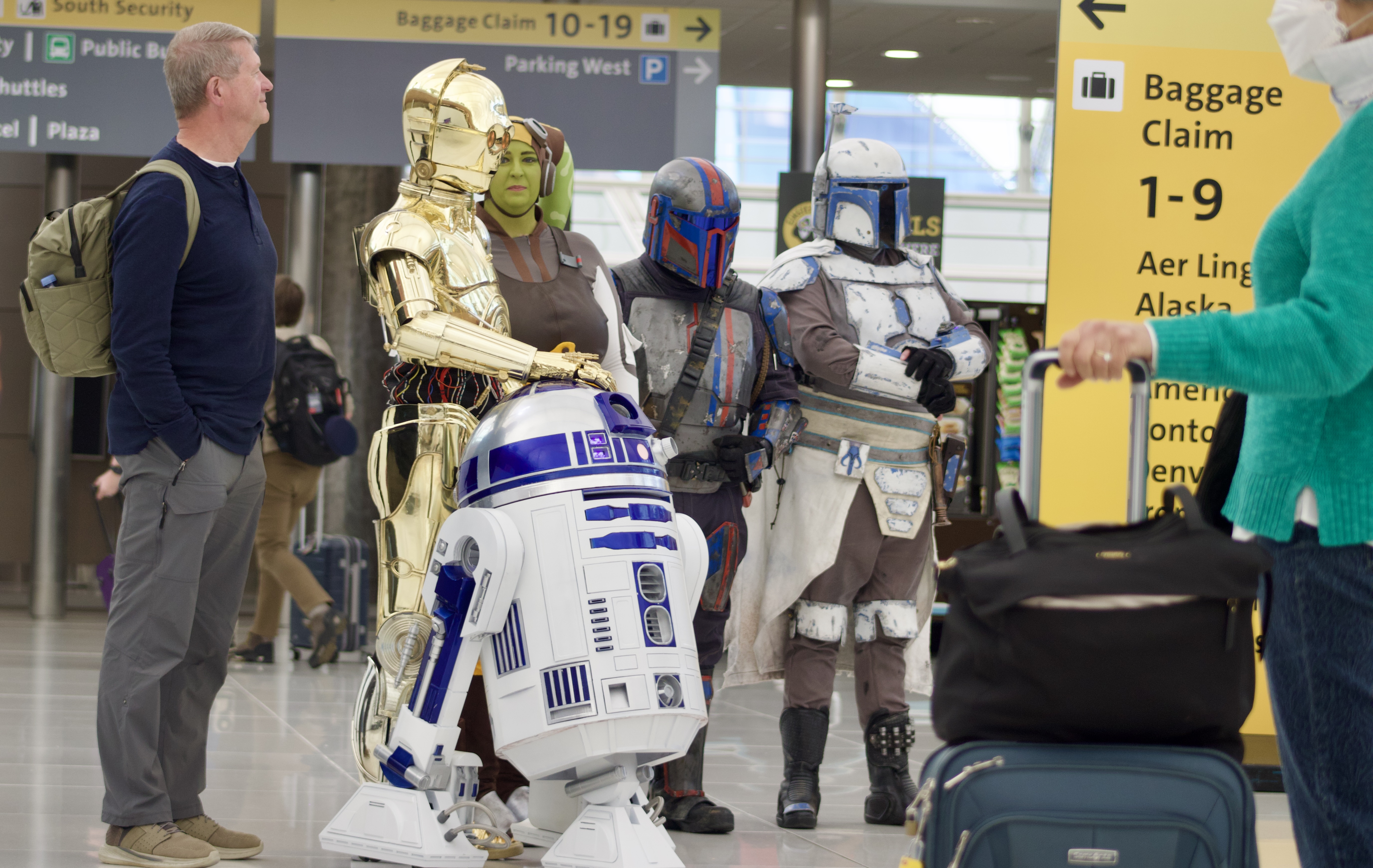Star Wars characters, including C-3PO and a robotic R2-D2, greet travelers at Denver International Airport for Star Wars Day on Sunday, May 4 in Denver, Colorado. (NoahFestensteinCity Government Reporternoah.festenstein@denvergazette.comhttps://denvergazette.com/content/tncms/avatars/9/f0/326/9f032698-379f-11ee-8053-8bacbed4931f.60984dba383441d9647e0e740a08a8e6.png)